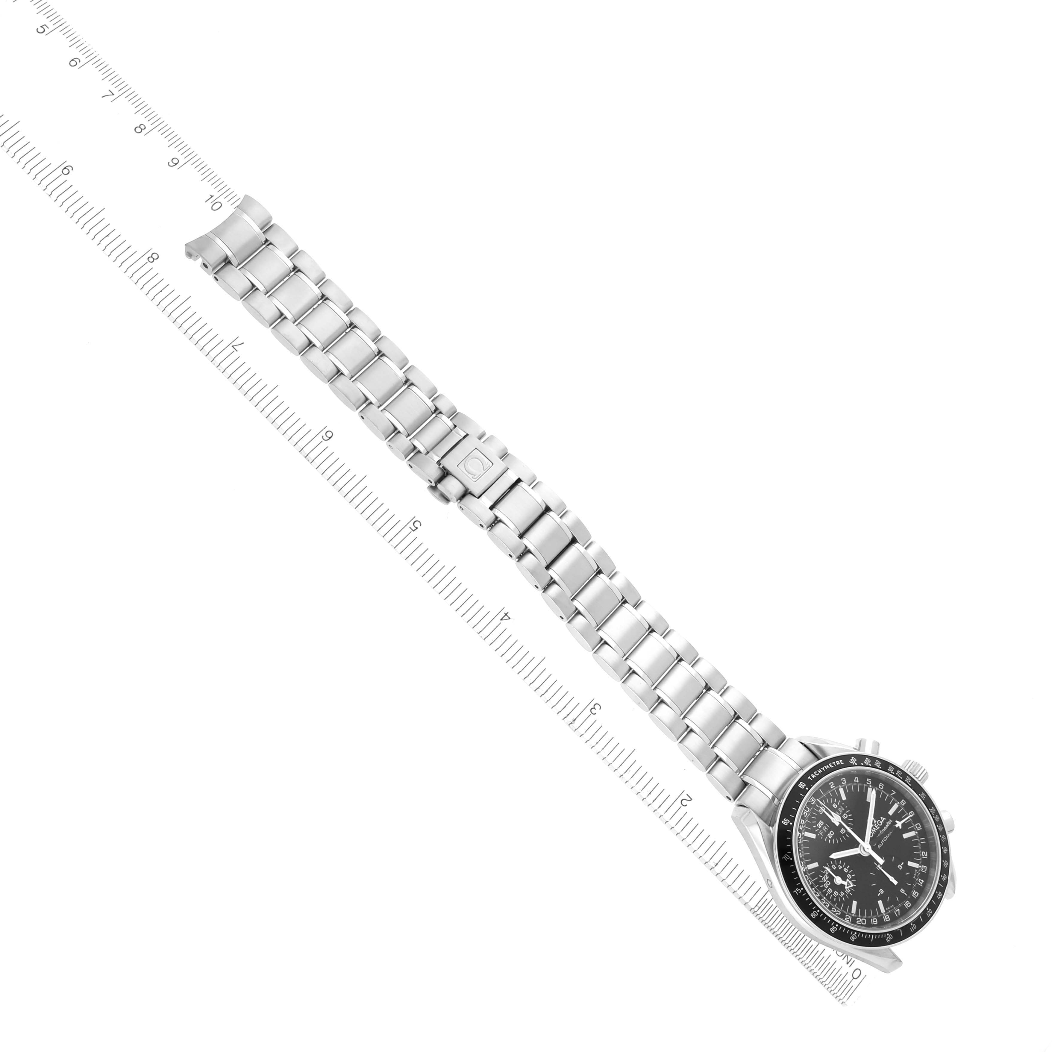 The Omega Speedmaster 3520.50.00 Men's Stainless Steel Black Dial 3520.50.00 Men's Stainless Steel Black Dial watch is shown from an above angle, displaying its full face and stainless steel bracelet alongside a ruler.