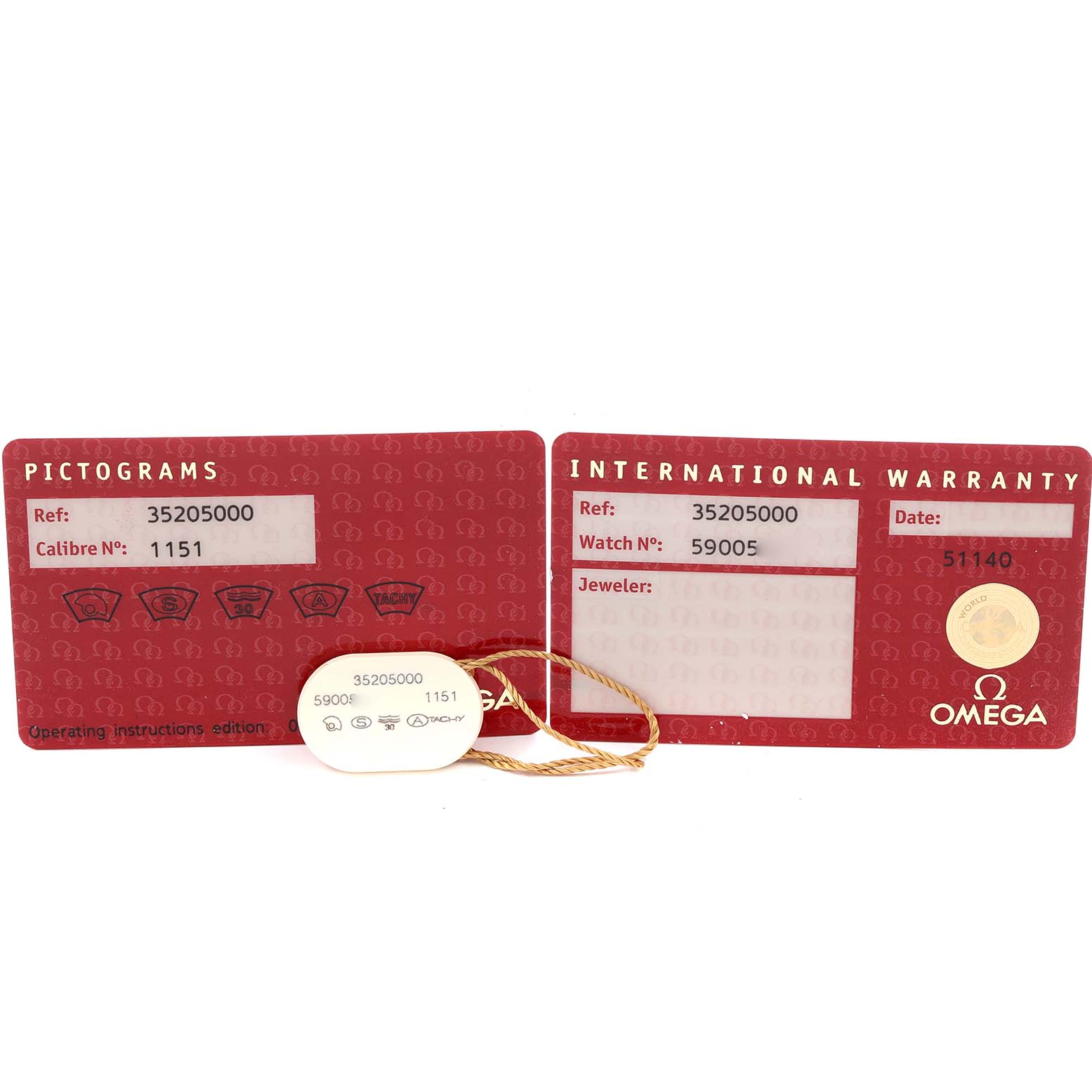 The image shows Omega Speedmaster 3520.50.00 Men's Stainless Steel Black Dial 3520.50.00 Men's Stainless Steel Black Dial model warranty cards and a hang tag from a top-down angle.