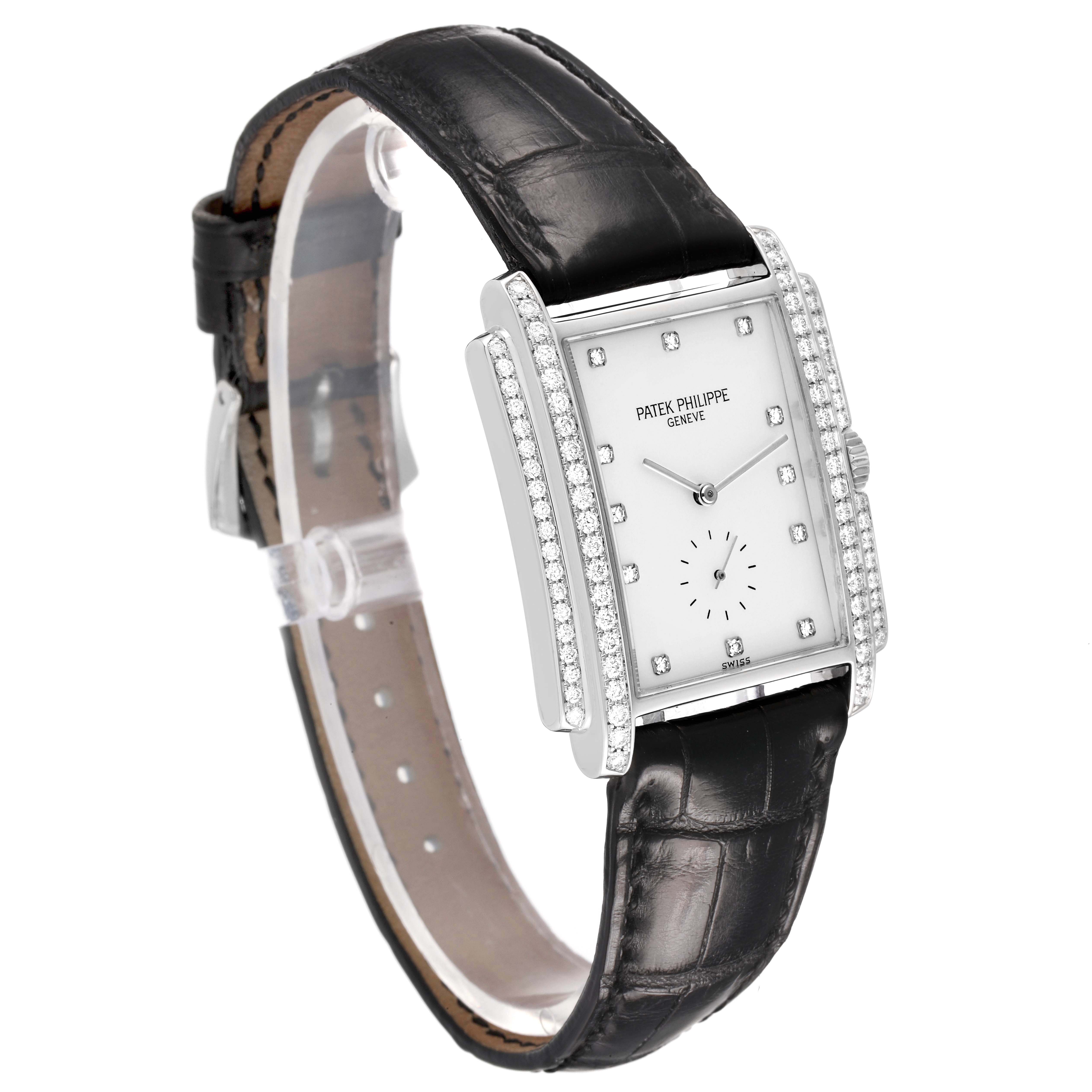 The Patek Philippe Gondolo 5025G Men's White Gold White Dial watch is shown at an angle highlighting its diamond-set bezel, rectangular face, and black leather strap.