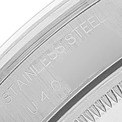 This close-up image shows the case back of the Rolex Air-King 14000 Men's Stainless Steel Pink Dial 14000 Men's Stainless Steel Pink Dial watch, highlighting the "Stainless Steel" engraving.