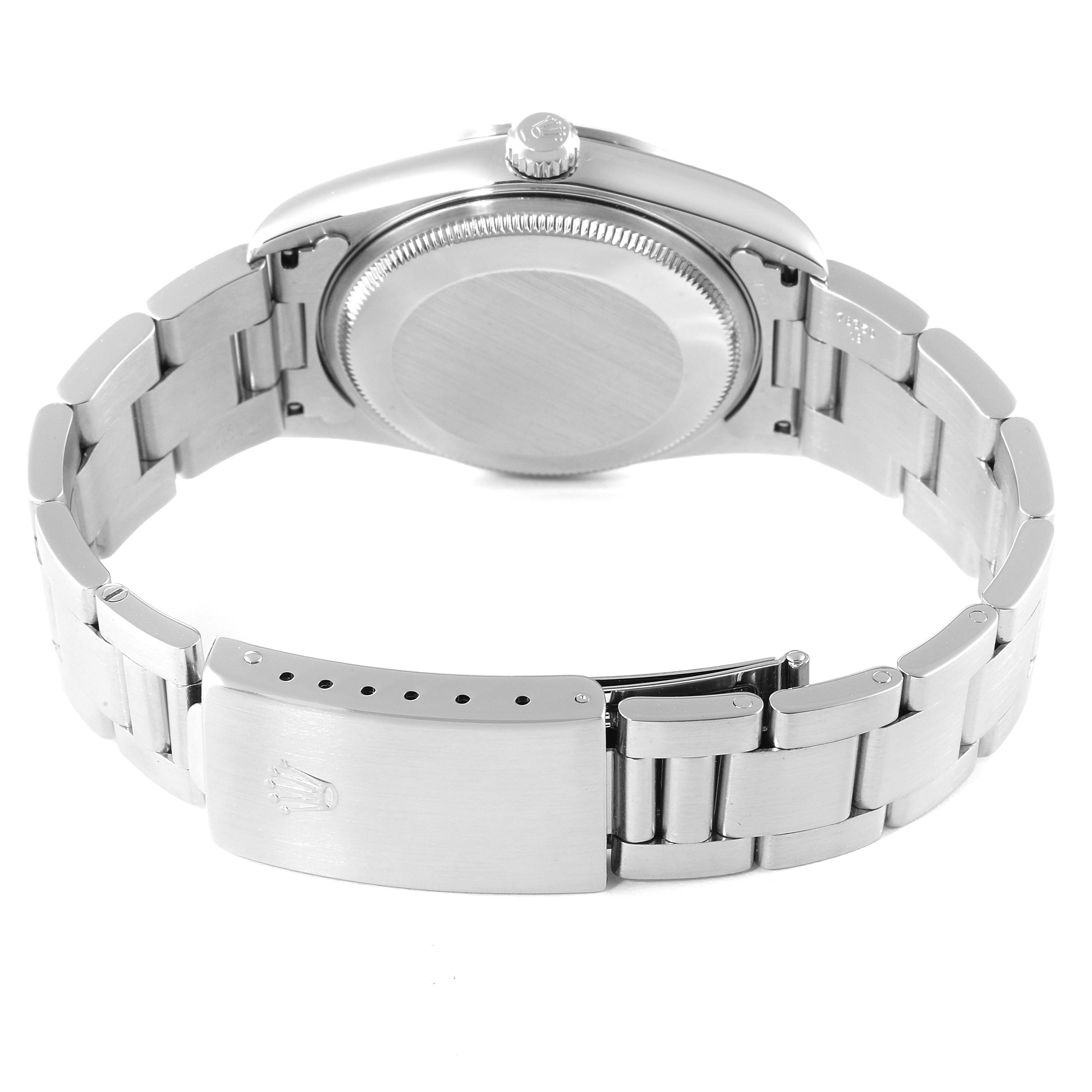 This image shows the backside of the Rolex Air-King 14000 Men's Stainless Steel Black Dial 14000 Men's Stainless Steel Black Dial watch, highlighting the case back, crown, and bracelet.