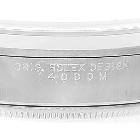 This close-up image shows part of the bezel and casing with model engraving on a Rolex Air-King 14000 Men's Stainless Steel Black Dial 14000 Men's Stainless Steel Black Dial watch.