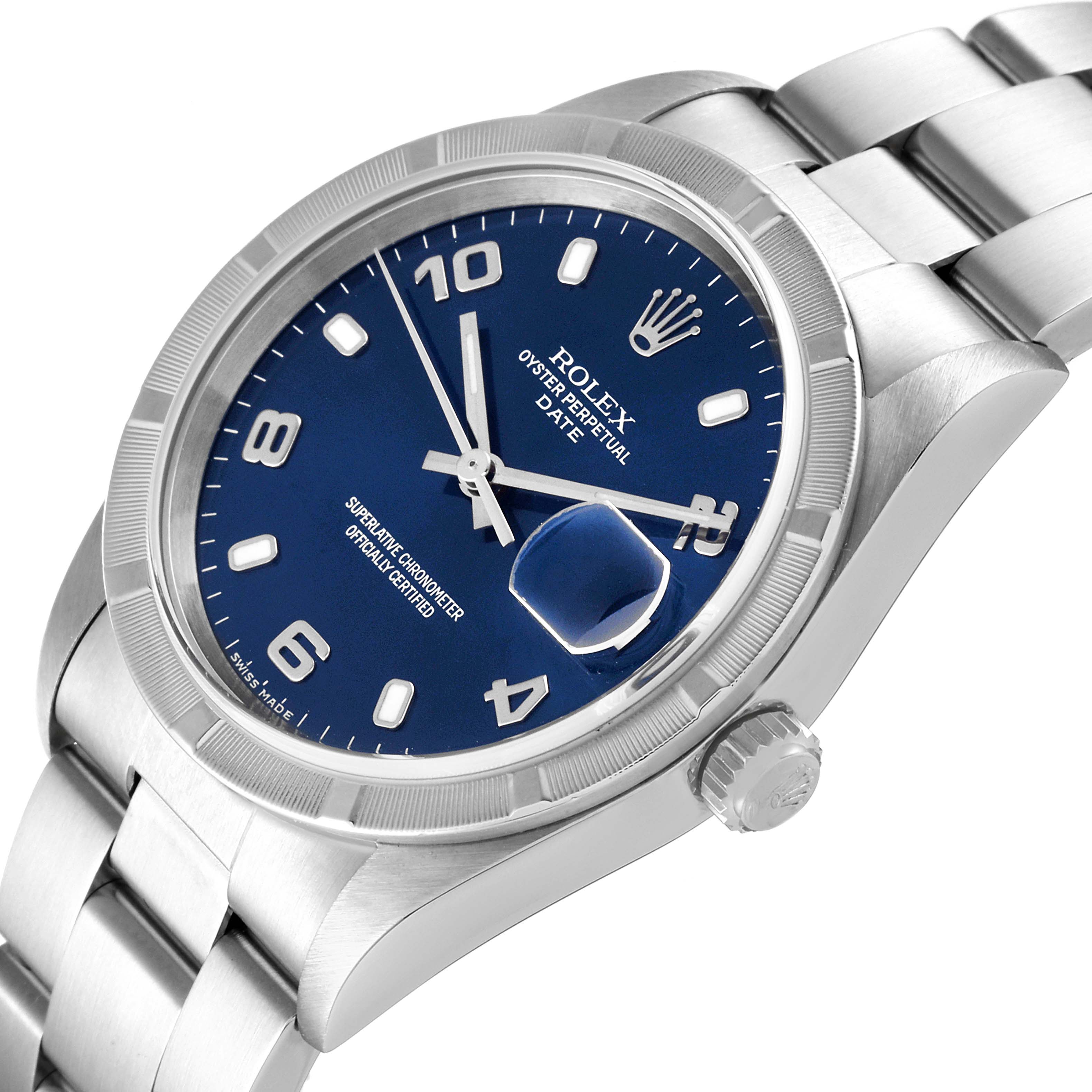 The Rolex Date 15210 Men's Stainless Steel Blue Dial 15210 Men's Stainless Steel Blue Dial model watch is shown at a slight angle, highlighting the bezel, dial, magnified date, and part of the bracelet.