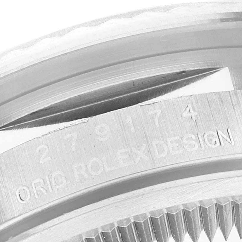 This image shows a close-up of the serial number and "Orig. Rolex Design" engraving on the case of a Rolex Datejust 279174 Women's Stainless Steel Grey Dial 279174 Women's Stainless Steel Grey Dial watch.