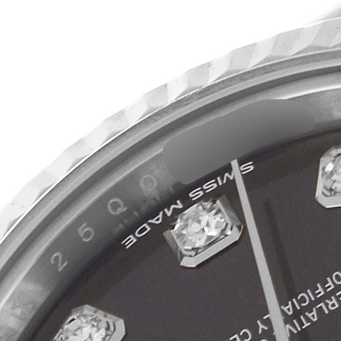 The image shows a close-up of the dial edge and bezel of a Rolex Datejust 279174 Women's Stainless Steel Grey Dial 279174 Women's Stainless Steel Grey Dial, highlighting diamond hour markers and part of the minute hand.