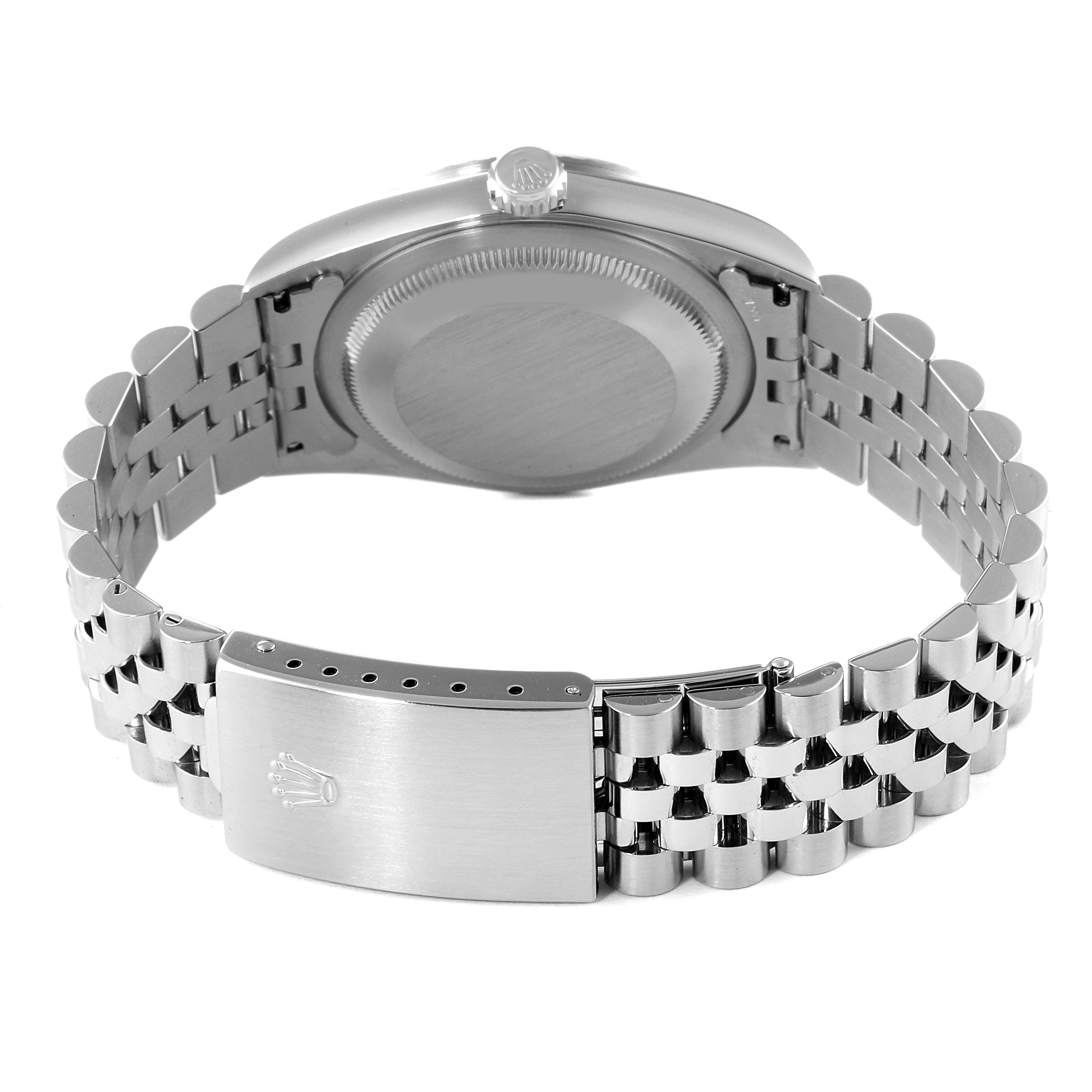 This image shows the back of a Rolex Datejust 16220 Men's Stainless Steel Blue Dial 16220 Men's Stainless Steel Blue Dial watch, highlighting the case, bracelet, and clasp.