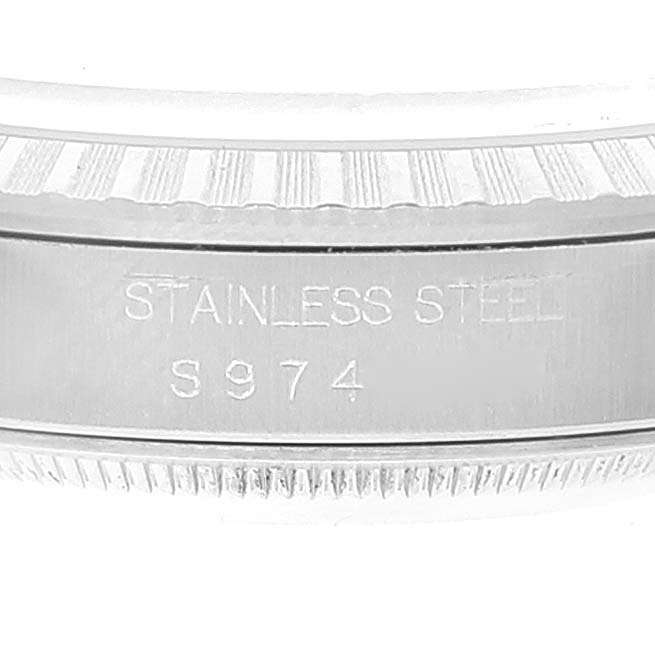 The image shows a close-up of the stainless steel side casing of a Rolex Datejust 16220 Men's Stainless Steel Blue Dial 16220 Men's Stainless Steel Blue Dial watch, engraved with "S974."