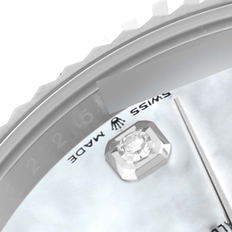 This close-up image shows the side and partial face of a Rolex Datejust 41 126334 Men
s Stainless Steel Mother of Pearl Dial 126334 Men
s Stainless Steel Mother of Pearl Dial, displaying the bezel, Swiss Made marking, and a diamond hour marker.