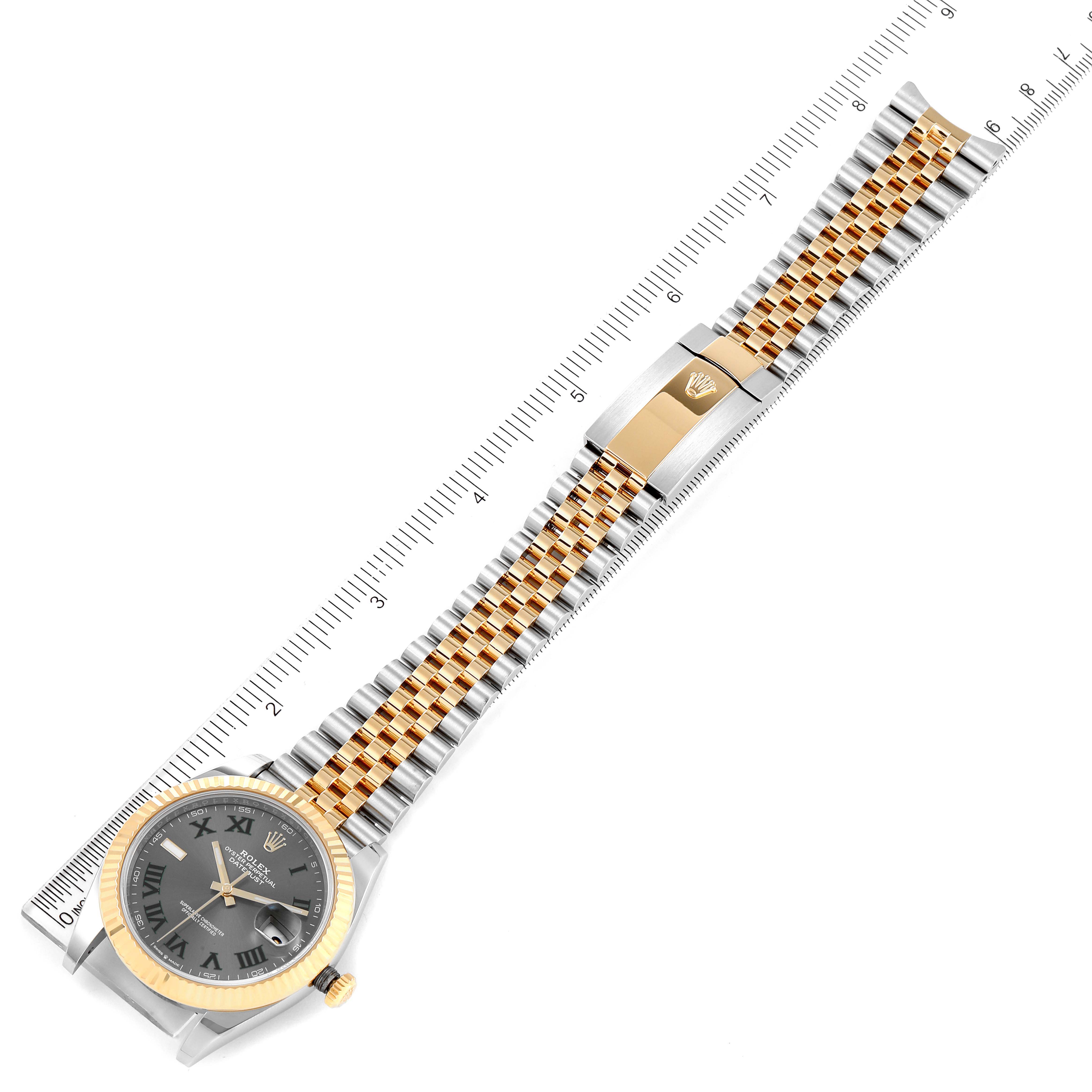 The Rolex Datejust 41 126333 Men's Steel and Gold (two tone) Grey Dial 126333 Men's Steel and Gold (two tone) Grey Dial is shown from a top-down angle, highlighting its face, bezel, crown, and jubilee bracelet with a deployment clasp.