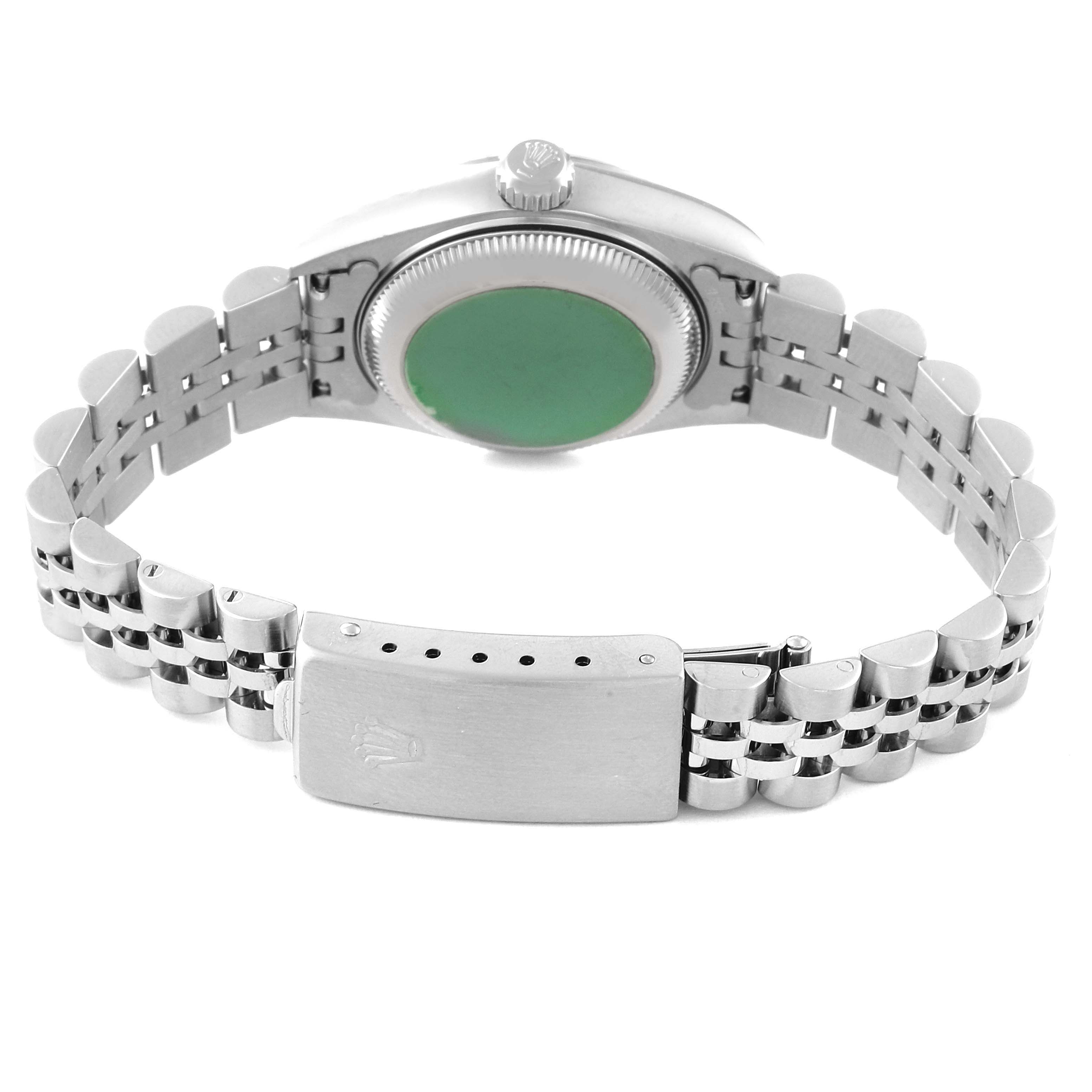 The image shows the back view of a Rolex Datejust 79174 Women's Stainless Steel Blue Dial 79174 Women's Stainless Steel Blue Dial watch, featuring the case back, crown, and bracelet clasp.