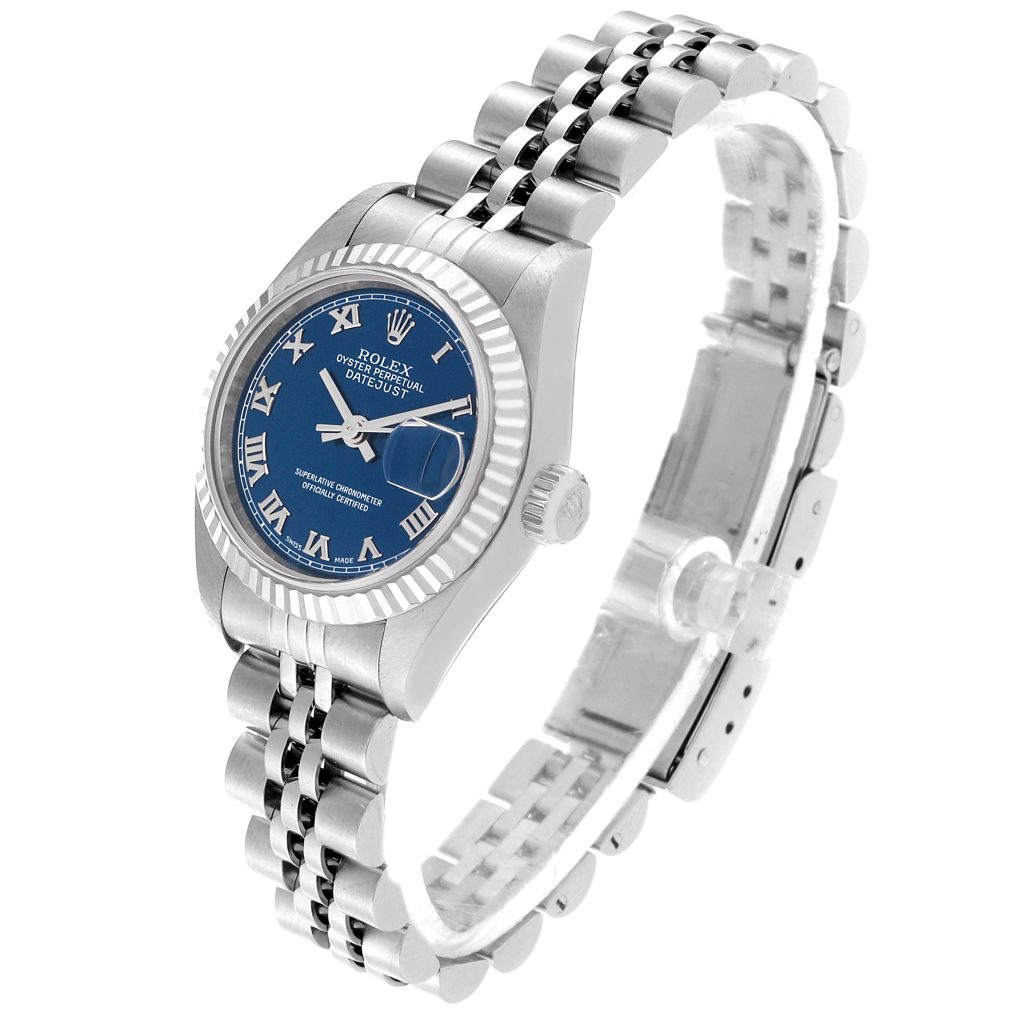 The Rolex Datejust 79174 Women's Stainless Steel Blue Dial 79174 Women's Stainless Steel Blue Dial watch is shown at an angled top view, displaying the bracelet, bezel, and the dial with Roman numeral markers.