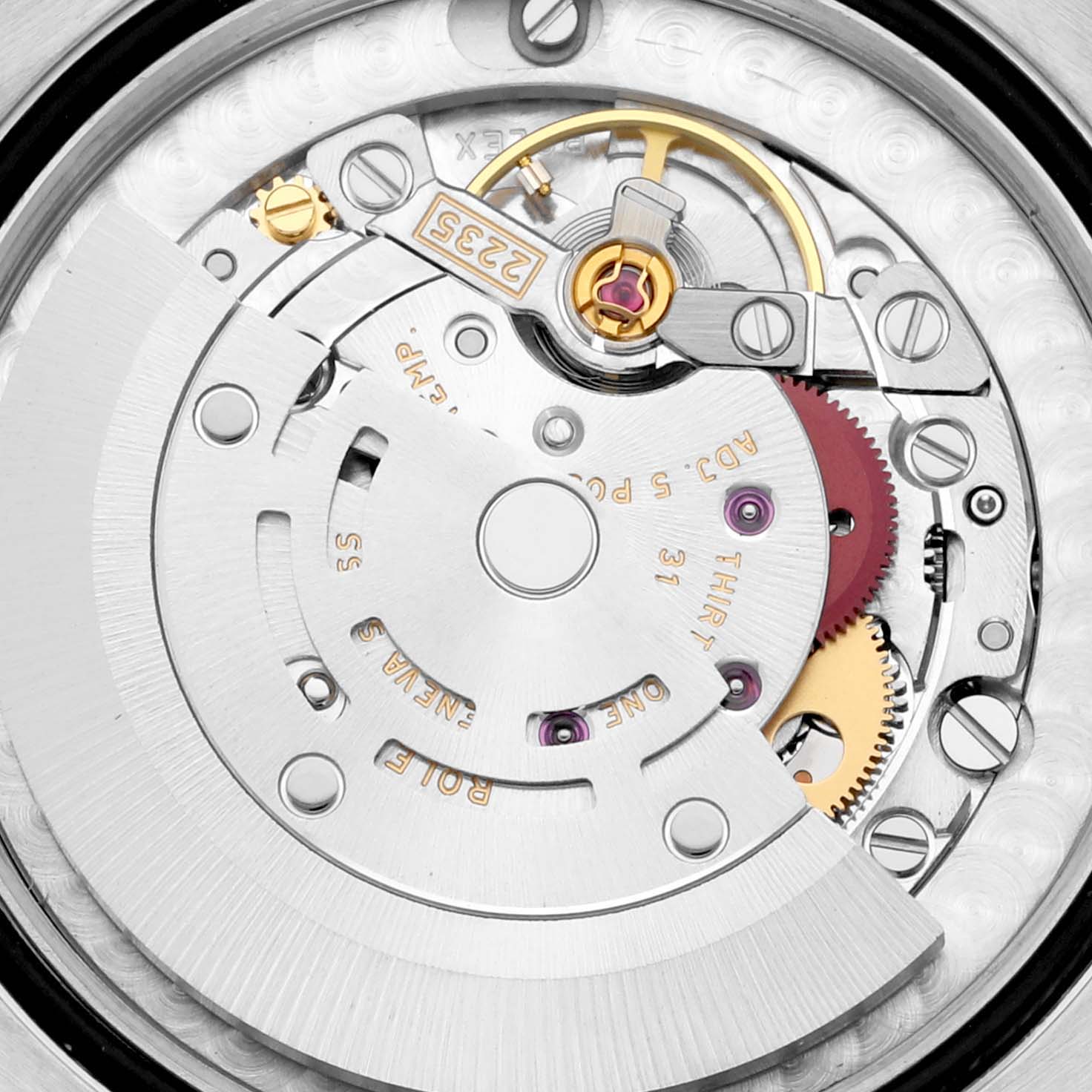 This close-up image shows the intricate inner movement mechanism of a Mid-Size Rolex watch, revealing gears and the rotor.