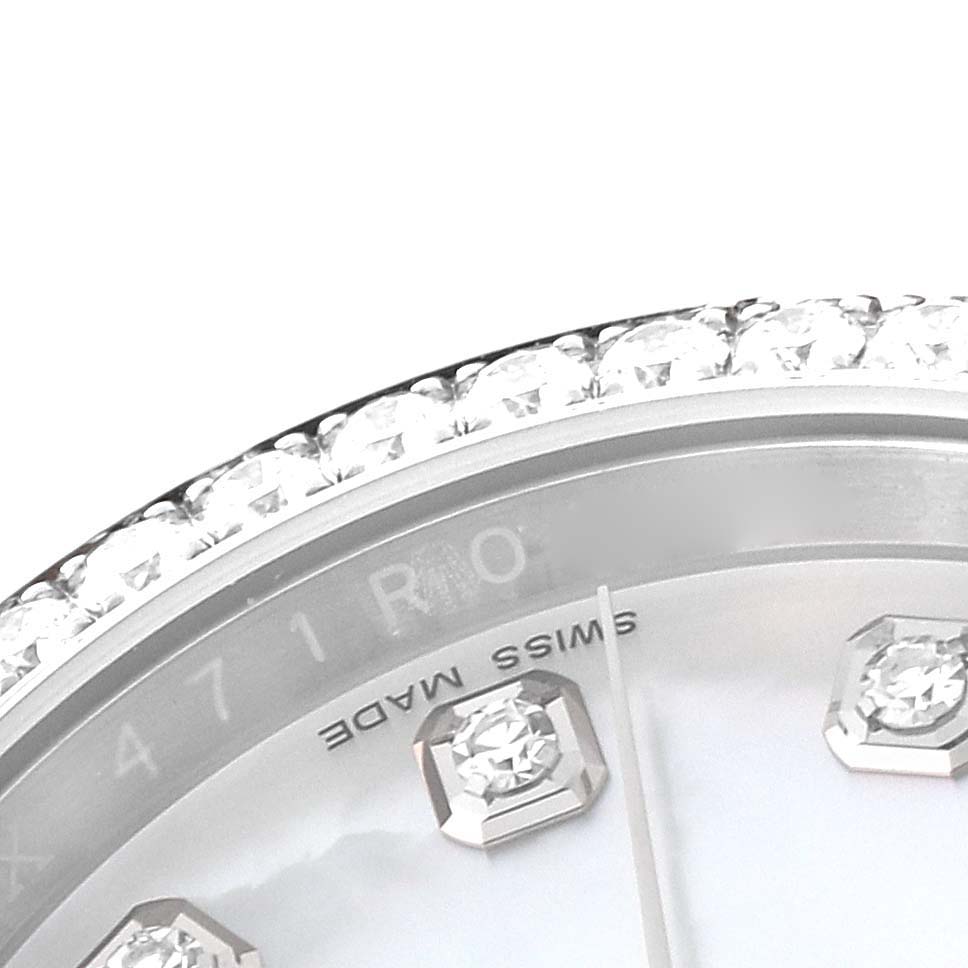 The image shows a close-up of the bezel and dial of a Rolex Datejust 116244 Men's Stainless Steel Mother of Pearl Dial 116244 Men's Stainless Steel Mother of Pearl Dial watch with diamond hour markers.