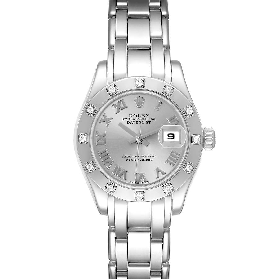 The Rolex Pearlmaster watch is shown from a top-down angle, displaying the silver dial, bezel with diamonds, and stainless steel bracelet.