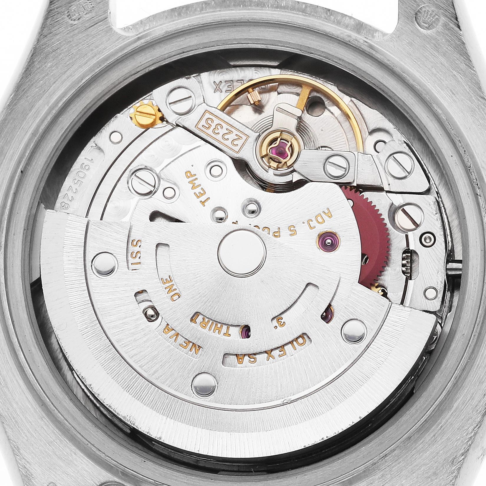 The image shows a close-up of the Rolex Pearlmaster 80319 Women
s White Gold Silver Dial 80319 Women
s White Gold Silver Dial
s movement from a top-down angle, highlighting its intricate mechanisms.