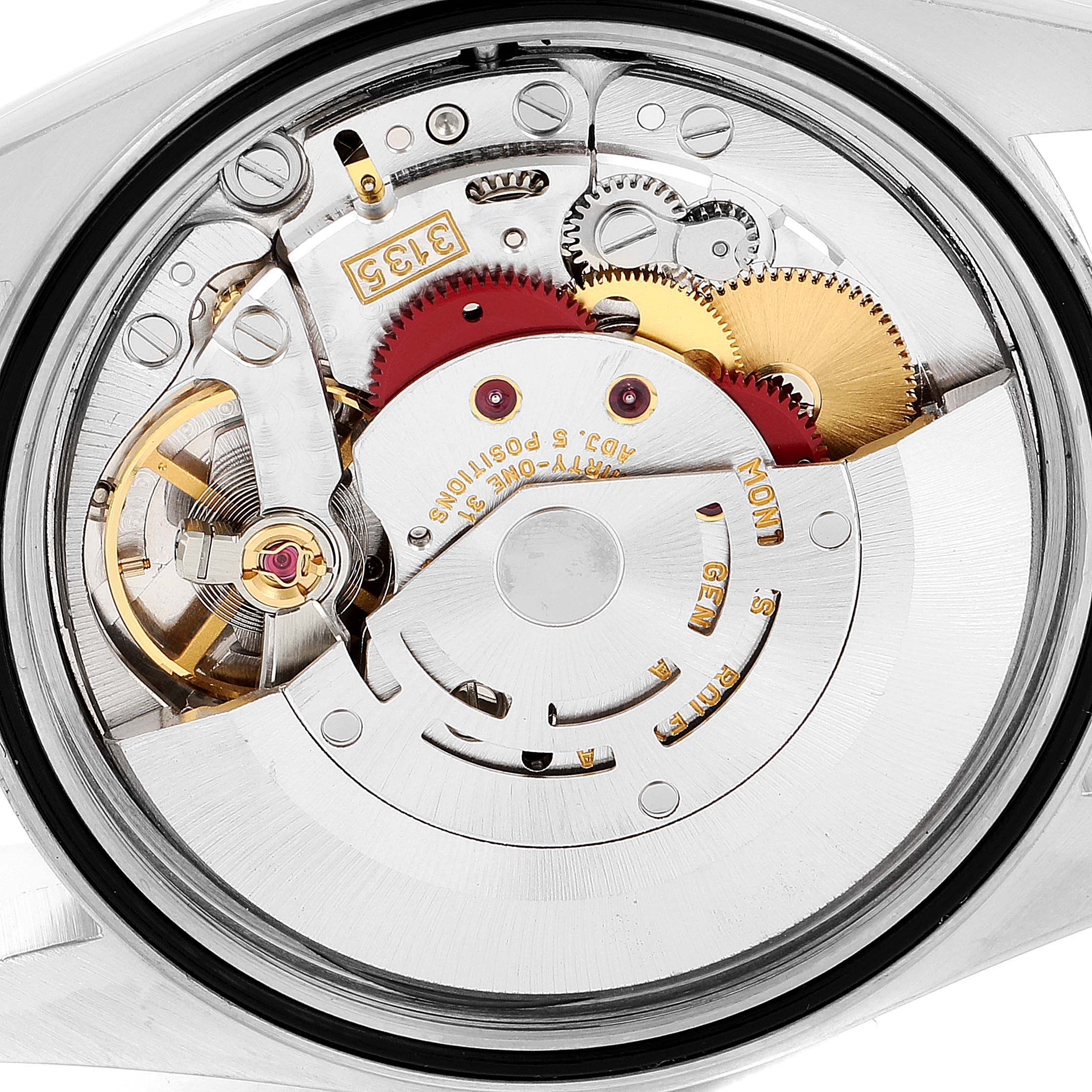 This image shows the intricate mechanical movement of the Rolex Datejust 16233 Men's Steel and Gold (two tone) Black Dial 16233 Men's Steel and Gold (two tone) Black Dial model from a close-up, internal angle.