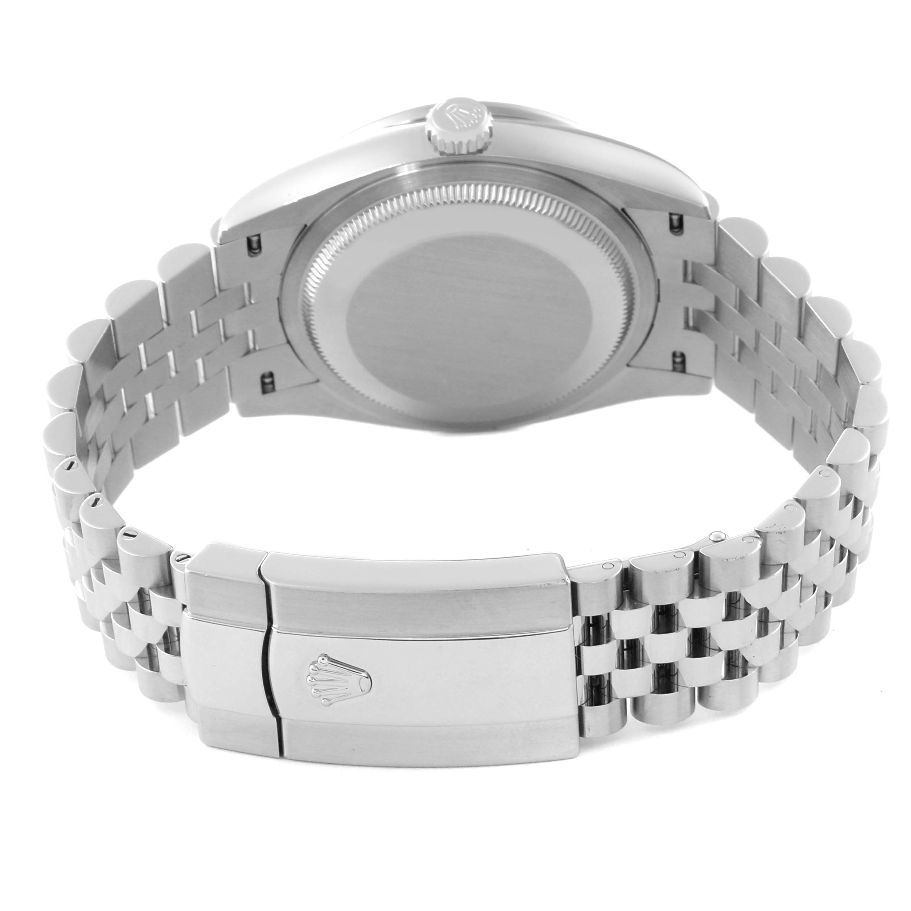 The image shows the back side of a Rolex Datejust 126284 Men's Stainless Steel Blue Dial 126284 Men's Stainless Steel Blue Dial watch, highlighting the case back, crown, and bracelet clasp.