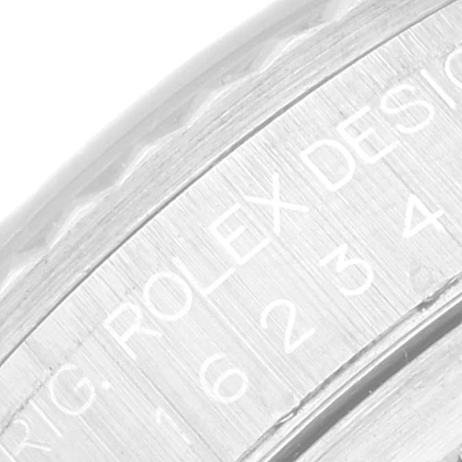 This close-up image shows the engraving on the outer edge of the case back of a Rolex Datejust 16234 Men's Stainless Steel Black Dial 16234 Men's Stainless Steel Black Dial watch.