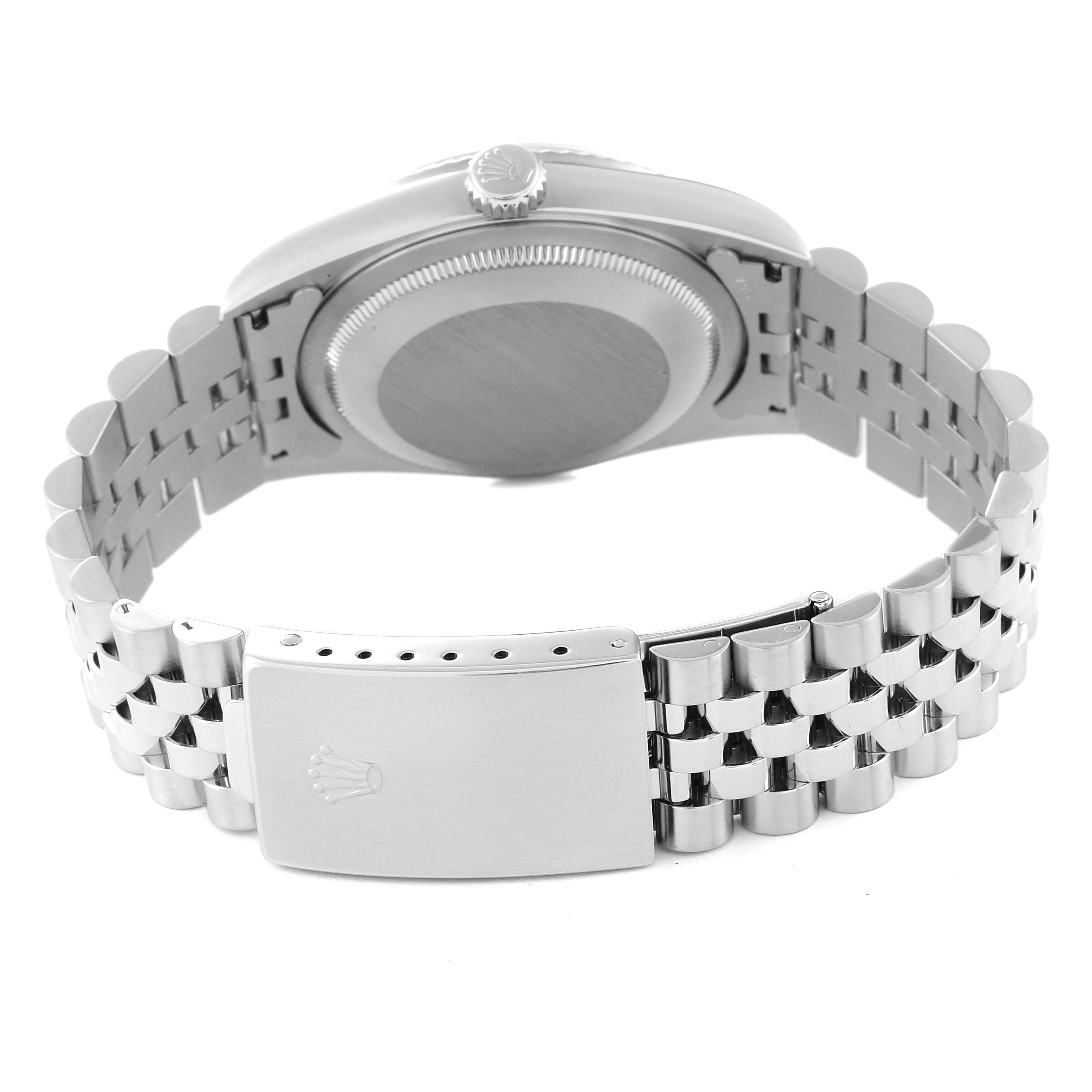 This image shows the back view of a Rolex Datejust 16234 Men's Stainless Steel Black Dial 16234 Men's Stainless Steel Black Dial watch, highlighting its case back, crown, and Jubilee bracelet with clasp.