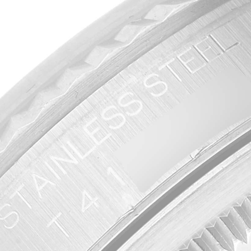 The image shows a close-up of the bezel and the edge of the dial on a Rolex Datejust 16234 Men's Stainless Steel Mother of Pearl Dial 16234 Men's Stainless Steel Mother of Pearl Dial watch.