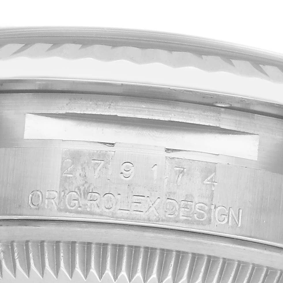 The image shows a close-up of the case side of a Rolex Datejust 279174 Women's Stainless Steel Grey Dial 279174 Women's Stainless Steel Grey Dial, highlighting the engraved serial number.