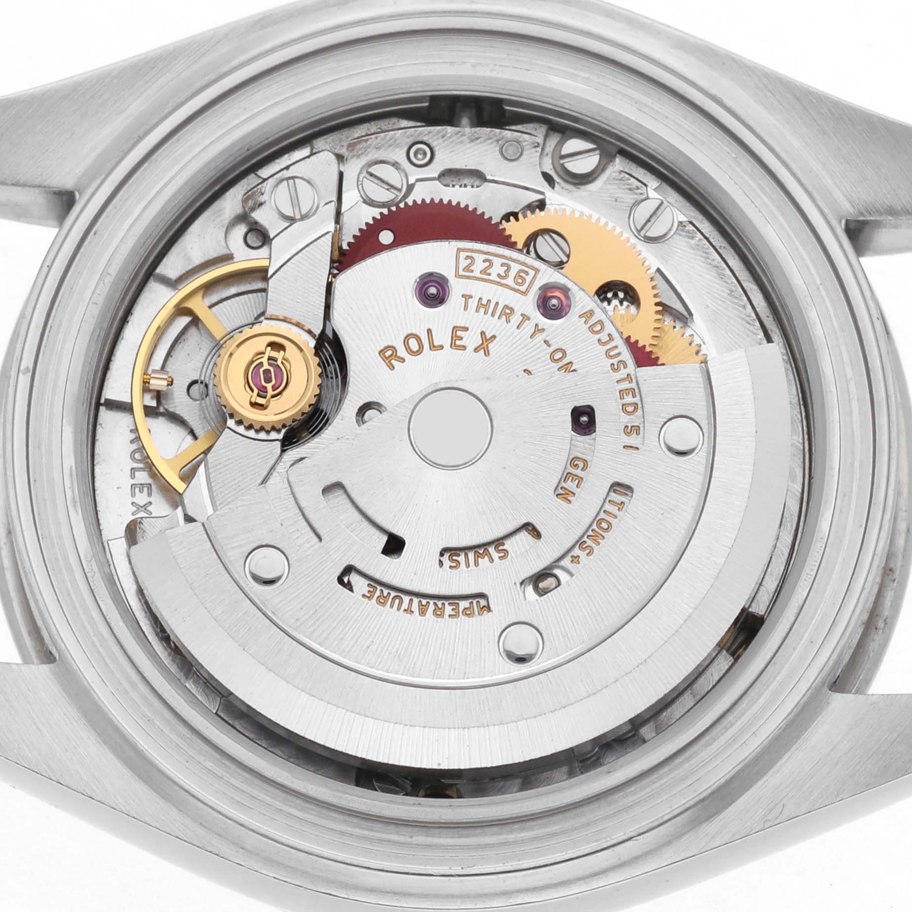 The image shows a Rolex Datejust 279174 Women's Stainless Steel Grey Dial 279174 Women's Stainless Steel Grey Dial watch's movement from a top-down angle, highlighting the intricate internal gears and mechanisms.