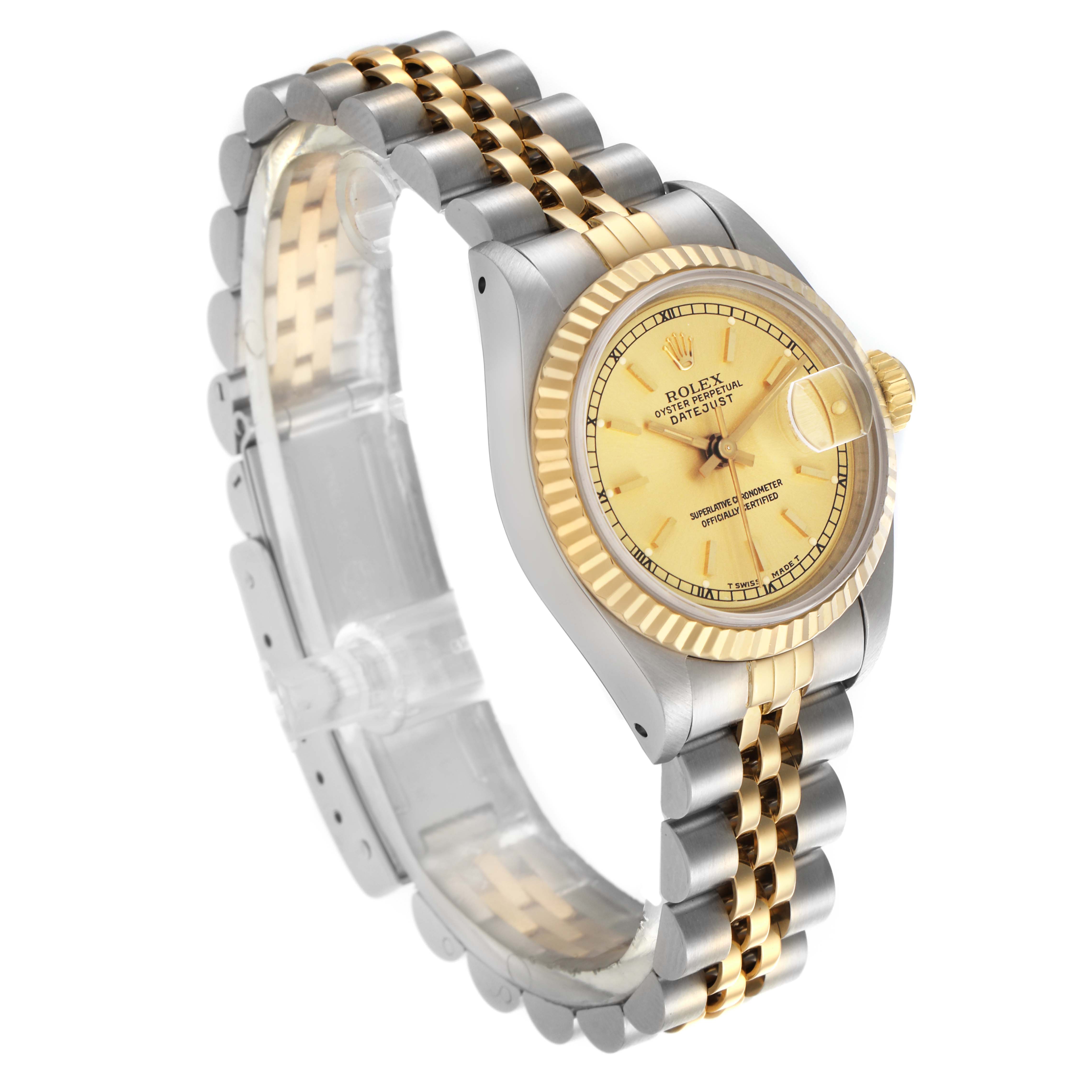 The Rolex Datejust 69173 Women
s Steel and Gold (two tone) Champagne Dial 69173 Women
s Steel and Gold (two tone) Champagne Dial watch is shown at a three-quarter angle, highlighting its gold bezel, champagne dial, and two-tone bracelet.