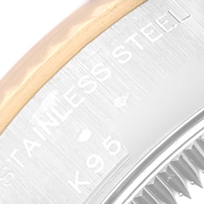 This image shows a close-up angle of the case back edge and the stainless steel inscription on the Rolex Datejust 79173 Women's Steel and Gold (two tone) Champagne Dial 79173 Women's Steel and Gold (two tone) Champagne Dial.