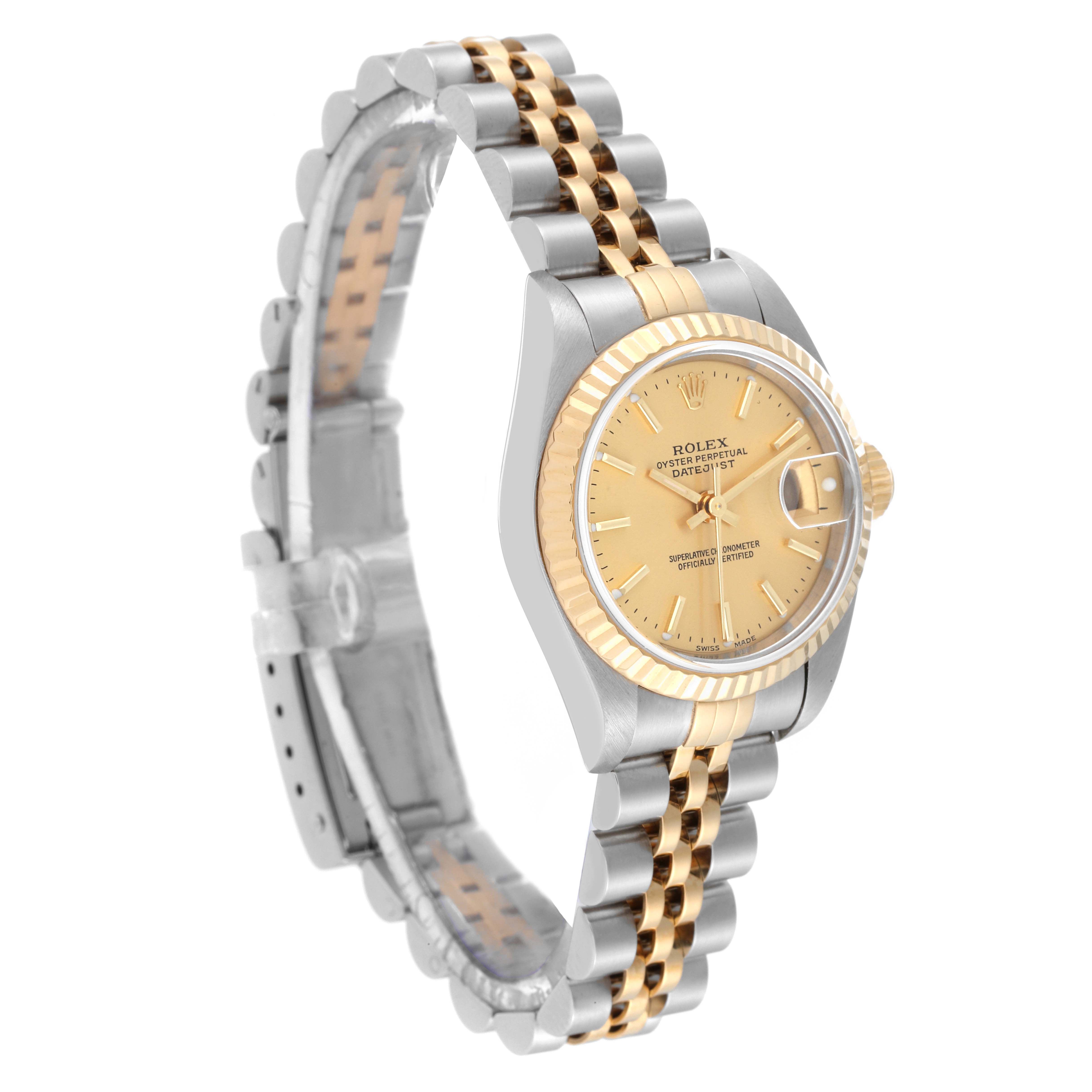 The image shows a side-angle view of a Rolex Datejust 79173 Women's Steel and Gold (two tone) Champagne Dial 79173 Women's Steel and Gold (two tone) Champagne Dial watch, highlighting its two-tone bracelet and gold fluted bezel.