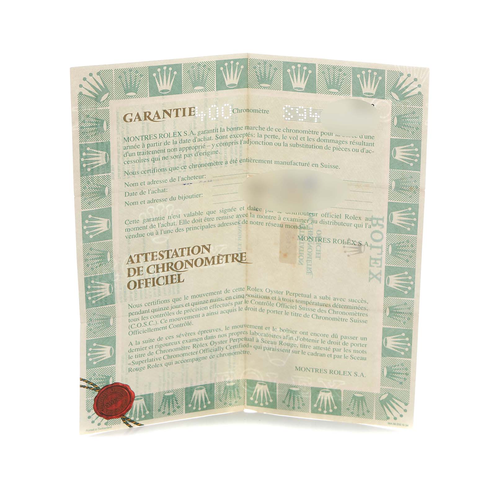 The image shows a folded warranty certificate for a Rolex Datejust 69173 Women's Steel and Gold (two tone) White Dial 69173 Women's Steel and Gold (two tone) White Dial watch, featuring the brand's logo and text details.