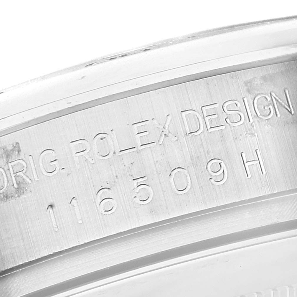 This image shows a close-up of the serial number engraving on the case of a Rolex Daytona 116509 Men's White Gold Blue Dial 116509 Men's White Gold Blue Dial watch.