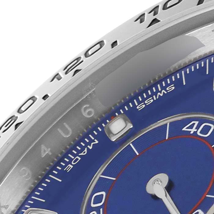 The image shows a close-up of the bezel, dial, and part of the minute markers of the Rolex Daytona 116509 Men's White Gold Blue Dial 116509 Men's White Gold Blue Dial watch.
