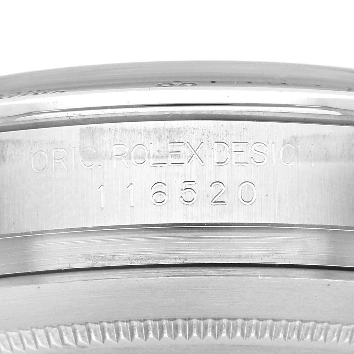 The image shows the side view of a Rolex Daytona 116520 Men's Stainless Steel Black Dial 116520 Men's Stainless Steel Black Dial watch case, highlighting its model number engraving.