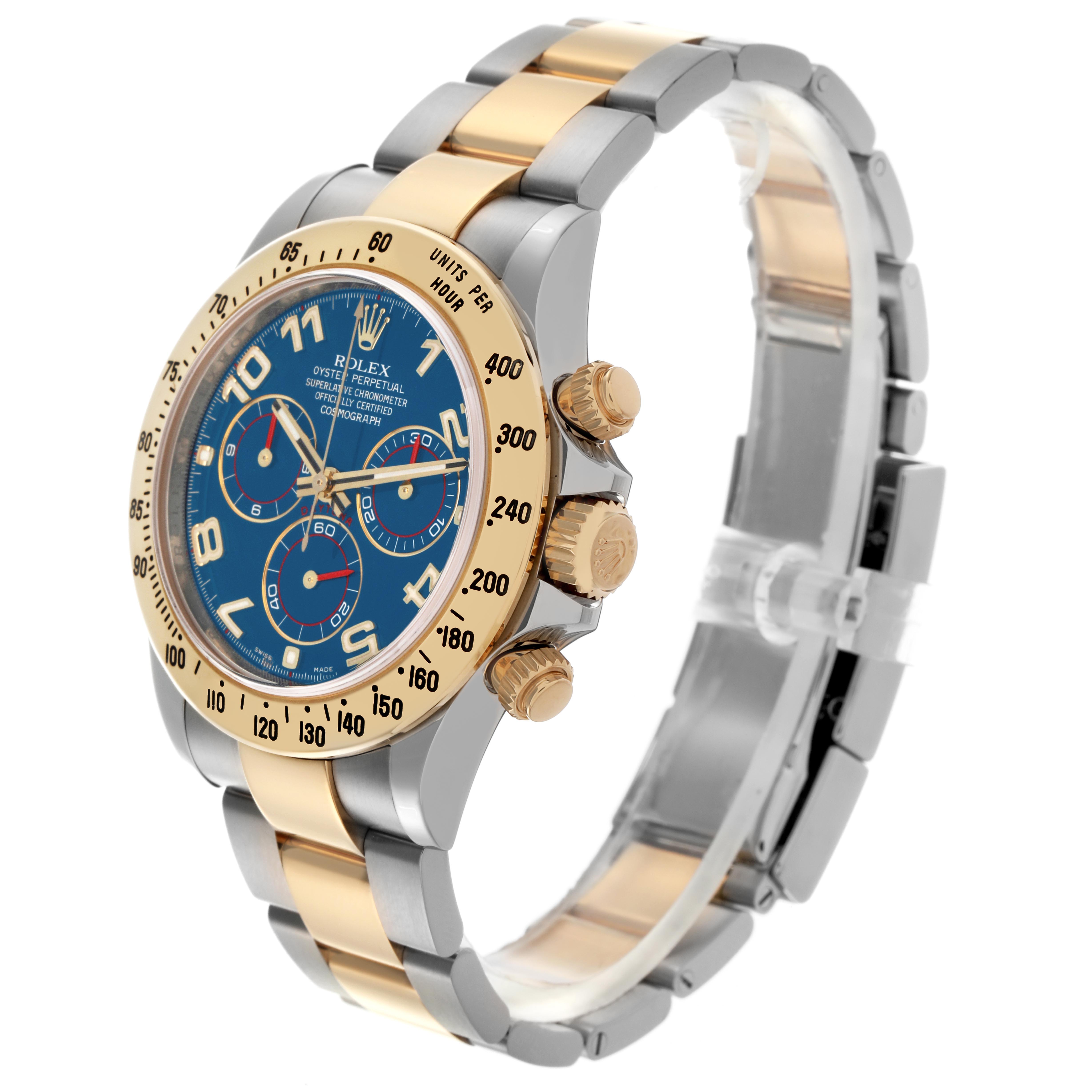 The Rolex Daytona 116523 Men's Steel and Gold (two tone) Blue Dial 116523 Men's Steel and Gold (two tone) Blue Dial is shown at a three-quarter angle, highlighting the face, bezel, side buttons, and two-tone bracelet.