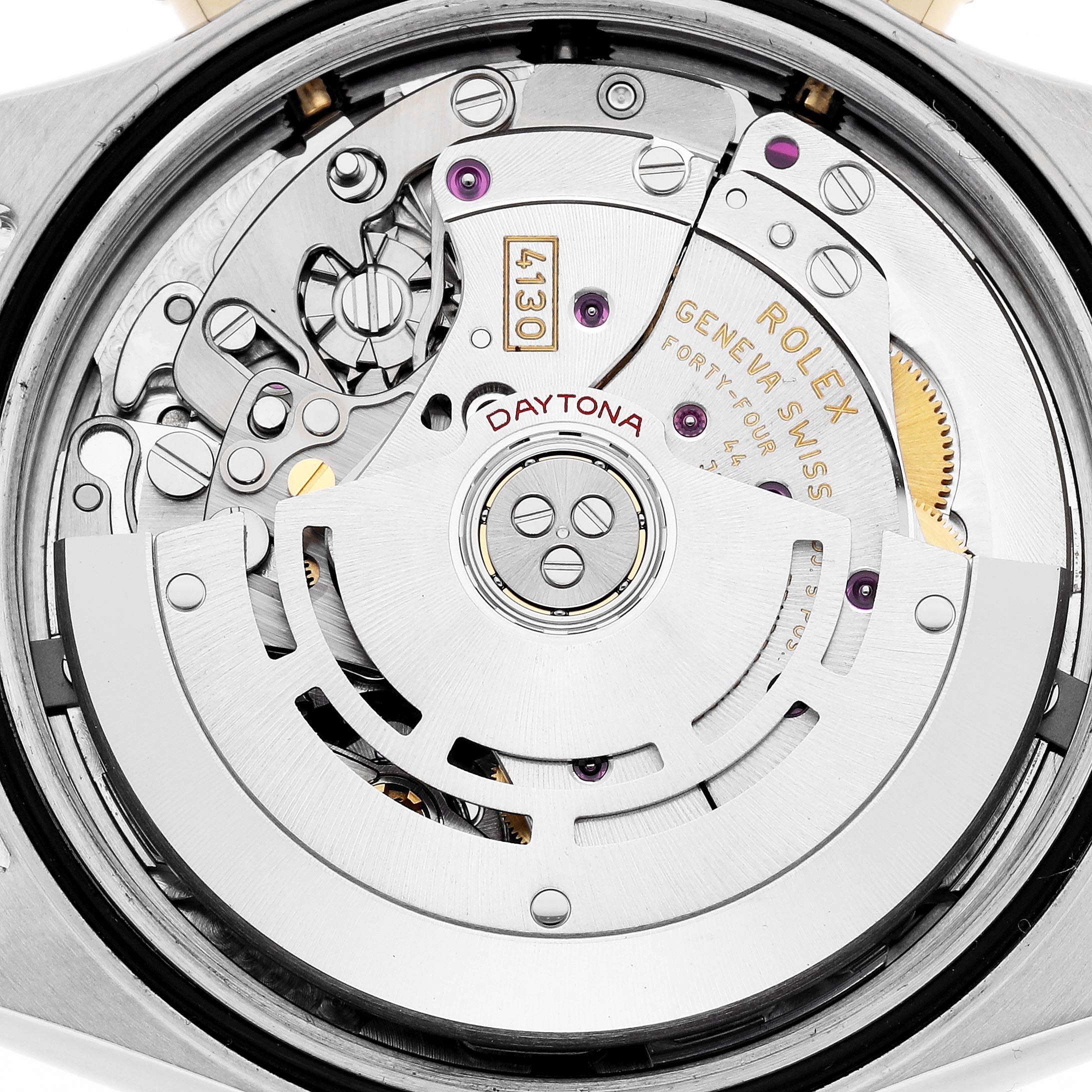 This image shows the movement of a Rolex Daytona 116523 Men's Steel and Gold (two tone) Blue Dial 116523 Men's Steel and Gold (two tone) Blue Dial watch, focusing on its intricate mechanical components and rotor.