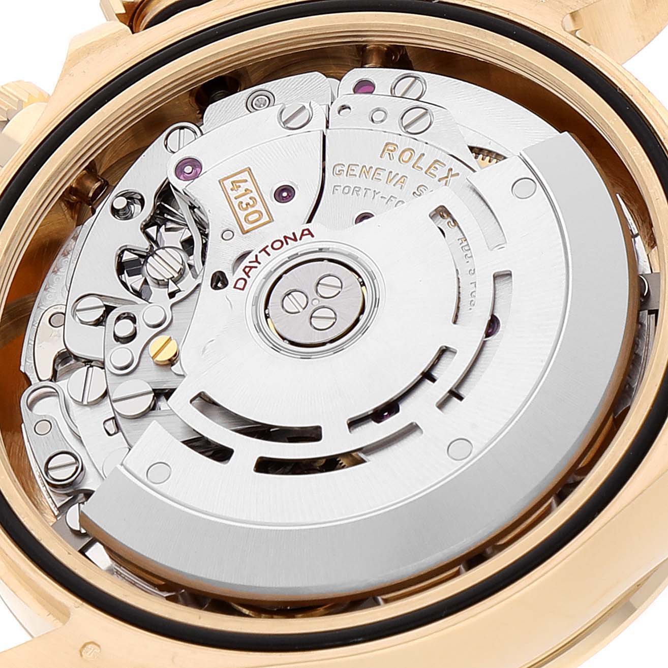 This image shows the movement and intricate internal mechanisms of a Rolex Daytona 116508 Men's Yellow Gold Champagne Dial 116508 Men's Yellow Gold Champagne Dial watch.