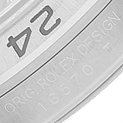 This close-up image of the Rolex Explorer 16570 Men
s Stainless Steel Black Dial 16570 Men
s Stainless Steel Black Dial watch focuses on the engraved bezel and part of the inner ring with the model number.