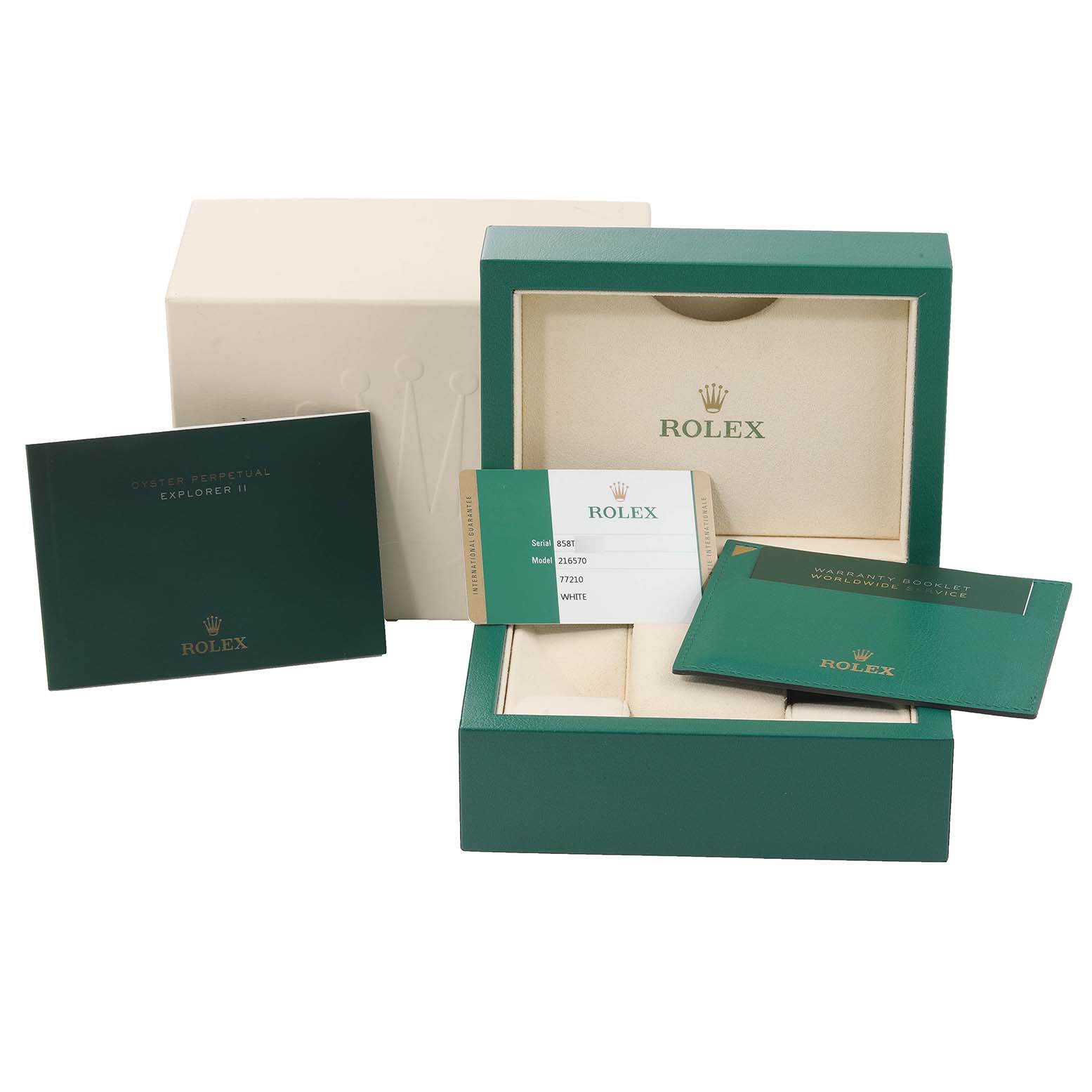 The image shows the accessories for a Rolex Explorer 216570 Men
s Stainless Steel White Dial 216570 Men
s Stainless Steel White Dial, including its box, warranty card, and manuals.