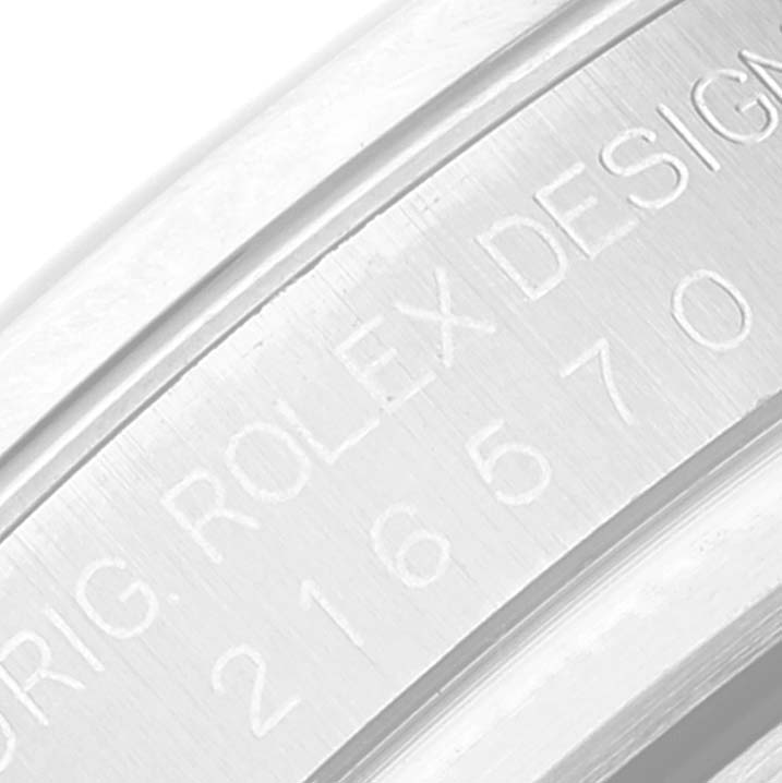 This close-up angle shows the engraved bezel of a Rolex Explorer 216570 Men
s Stainless Steel White Dial 216570 Men
s Stainless Steel White Dial watch.