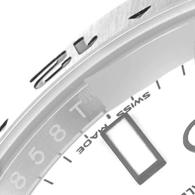 This image shows a close-up view of the dial, bezel, and markers of a Rolex Explorer 216570 Men
s Stainless Steel White Dial 216570 Men
s Stainless Steel White Dial watch.