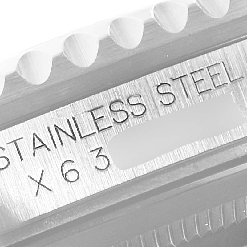 This image shows a close-up of the engraved case back and bezel of a Rolex GMT-Master 16700 Men's Stainless Steel Black Dial 16700 Men's Stainless Steel Black Dial watch, highlighting the stainless steel material.