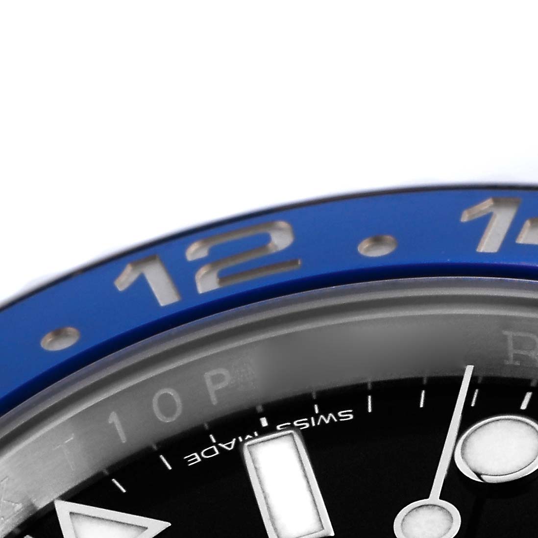 The image shows a close-up of the bezel and partial dial of a Rolex GMT-Master 126710 Men's Stainless Steel Black Dial 126710 Men's Stainless Steel Black Dial, highlighting the blue 12-hour marker.