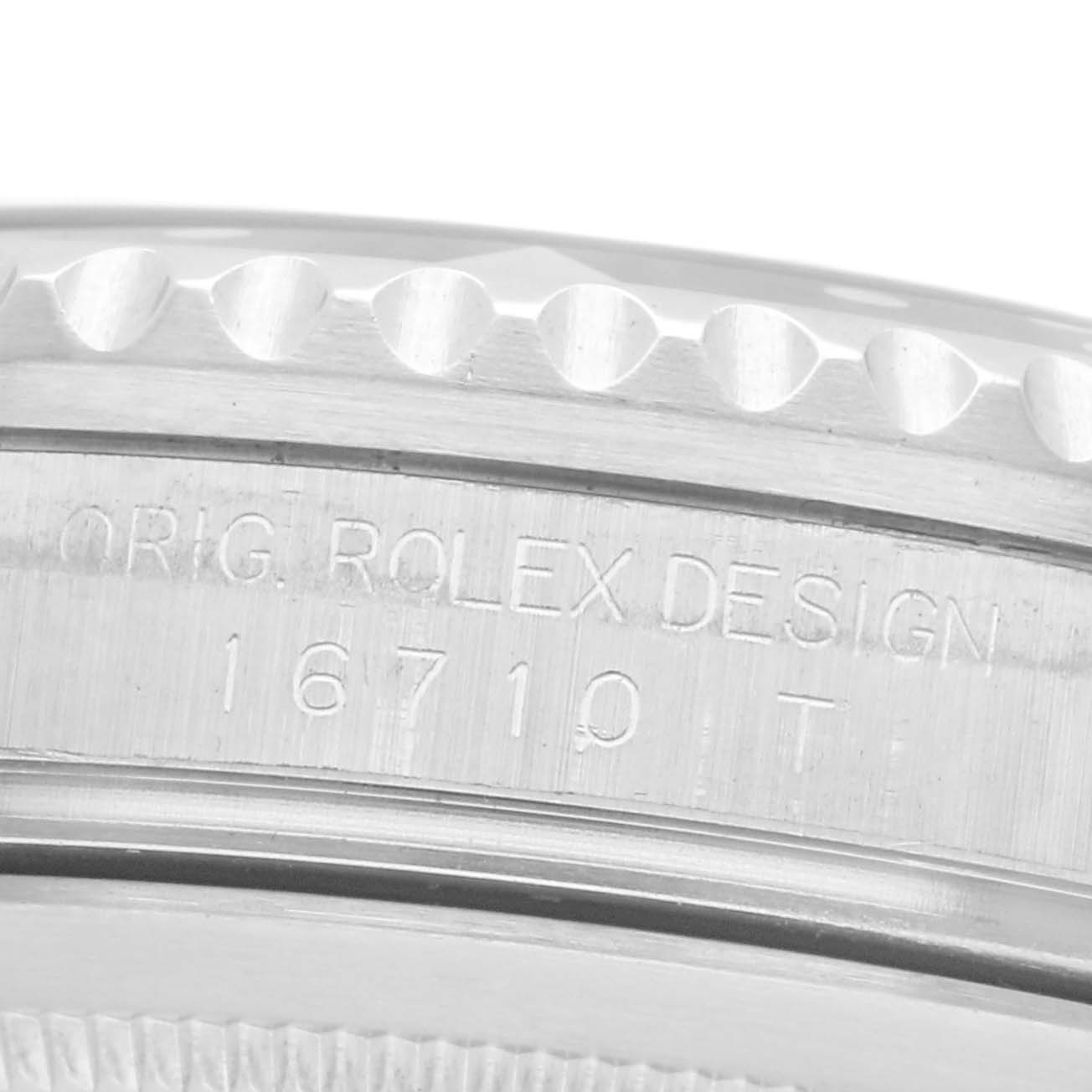 The image shows a close-up of the side of the Rolex GMT-Master 16710 Men's Stainless Steel Black Dial 16710 Men's Stainless Steel Black Dial, highlighting the engraved model number "16710."