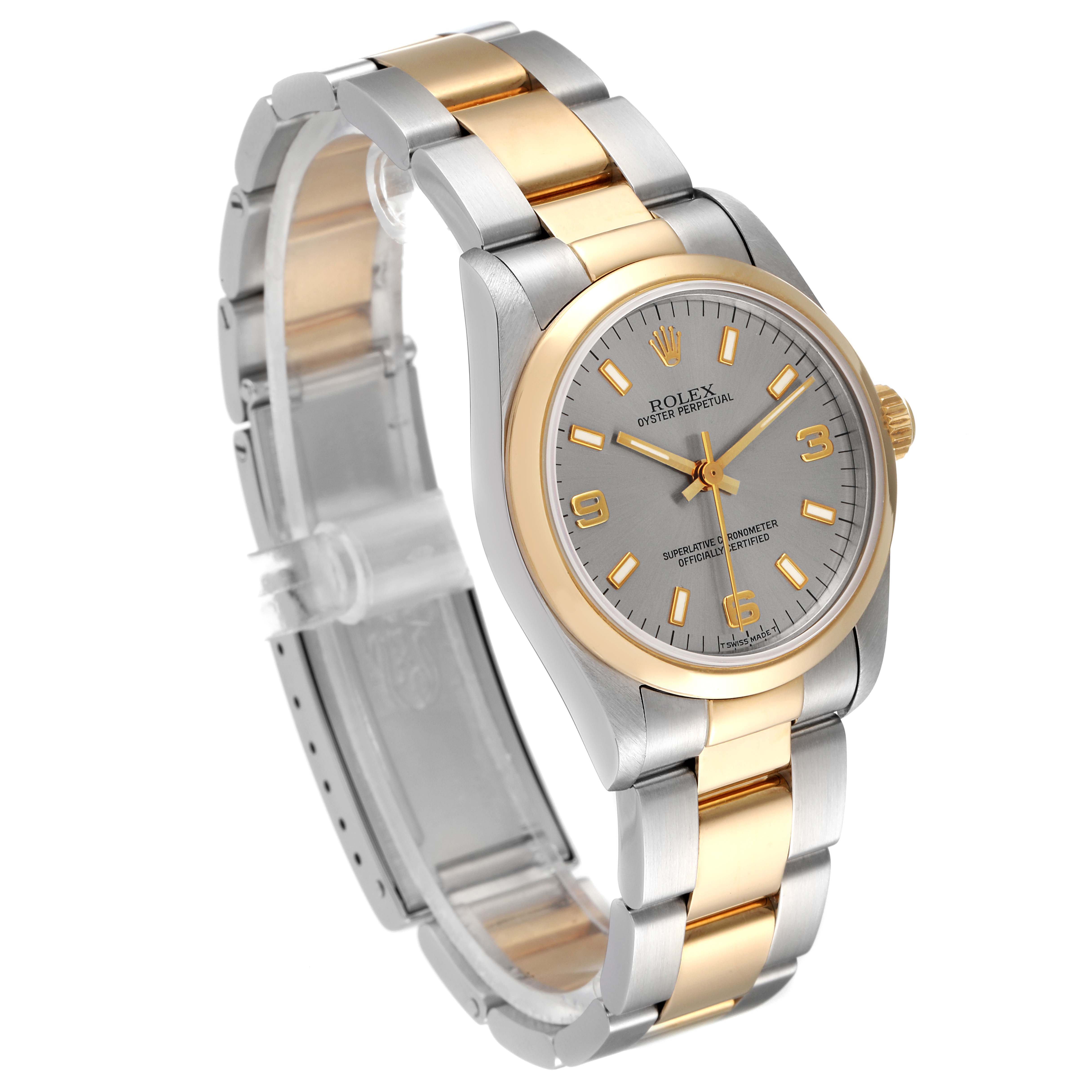 The image shows a mid-size Rolex Oyster Perpetual watch from a three-quarter angle, highlighting its face, bezel, and bracelet.