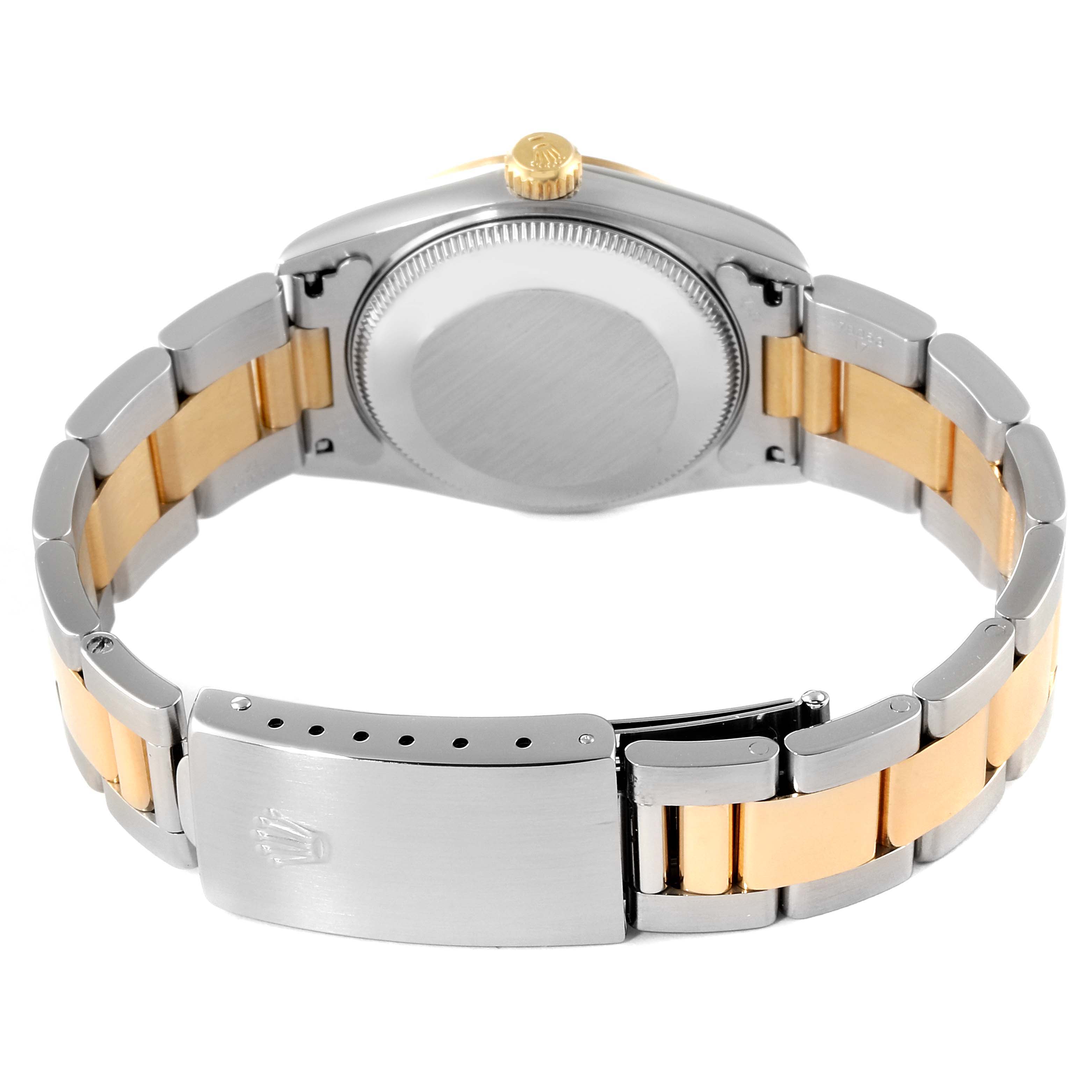 The image shows the back view of a Rolex Mid-Size 67483 Women
s Steel and Gold (two tone) Grey Dial 67483 Women
s Steel and Gold (two tone) Grey Dial watch, featuring its case back, crown, and bi-metal bracelet with clasp.
