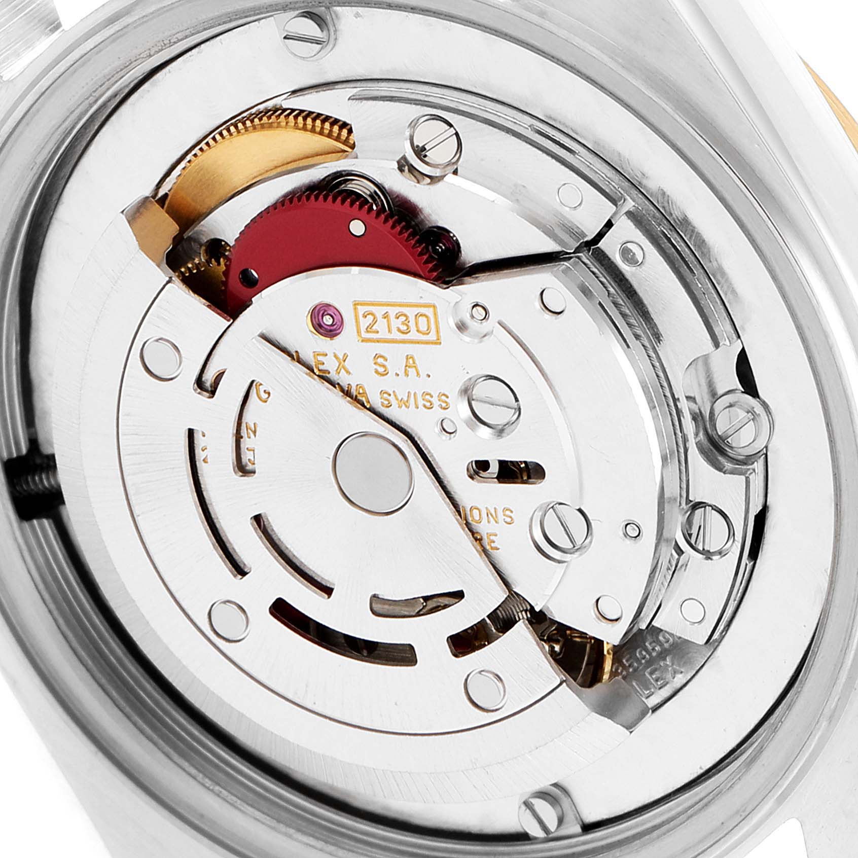 This image shows the rear view of the internal mechanism of the Rolex Mid-Size 67483 Women
s Steel and Gold (two tone) Grey Dial 67483 Women
s Steel and Gold (two tone) Grey Dial model watch, highlighting the movement parts.