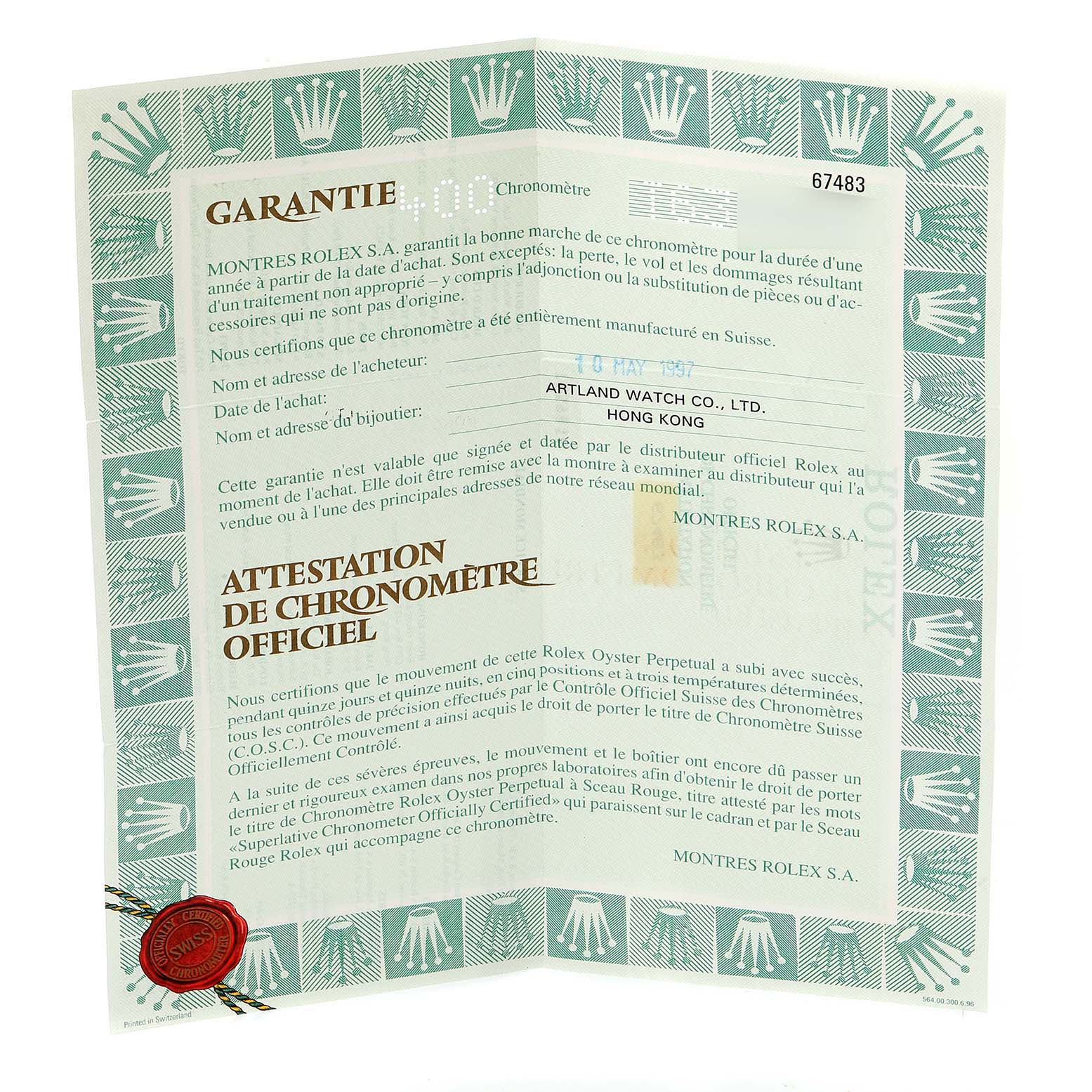 This image shows the unfolded guarantee and chronometer certification documents for a Mid-Size Rolex watch.