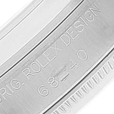 The image shows a close-up of the side of a Mid-Size Rolex watch case, specifically the engraved "ORIG. ROLEX DESIGN 68=40".