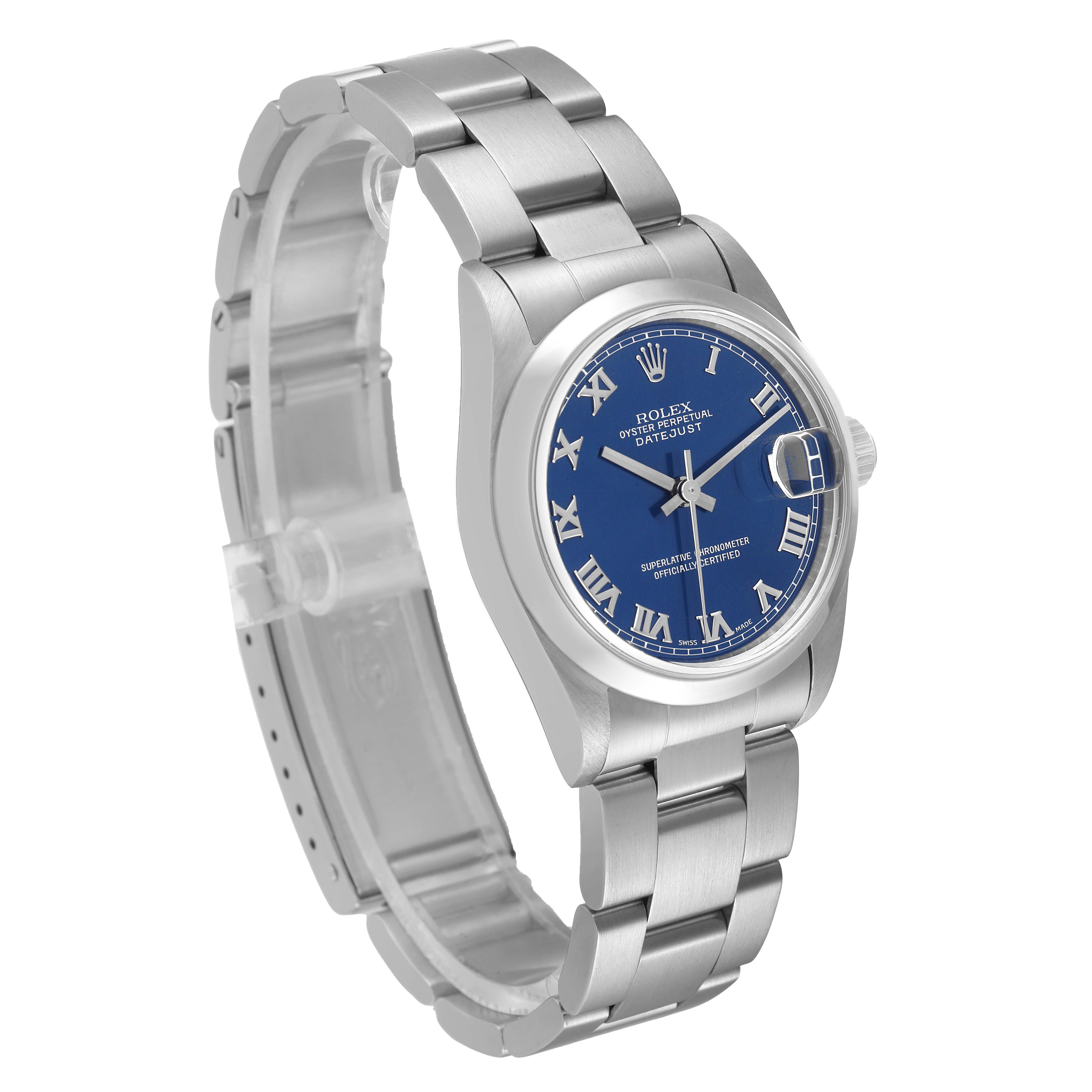 This image shows a Rolex Mid-Size 68240 Women
s Stainless Steel Blue Dial 68240 Women
s Stainless Steel Blue Dial Datejust watch at a three-quarter angle, featuring its stainless steel bracelet and blue dial with Roman numerals.