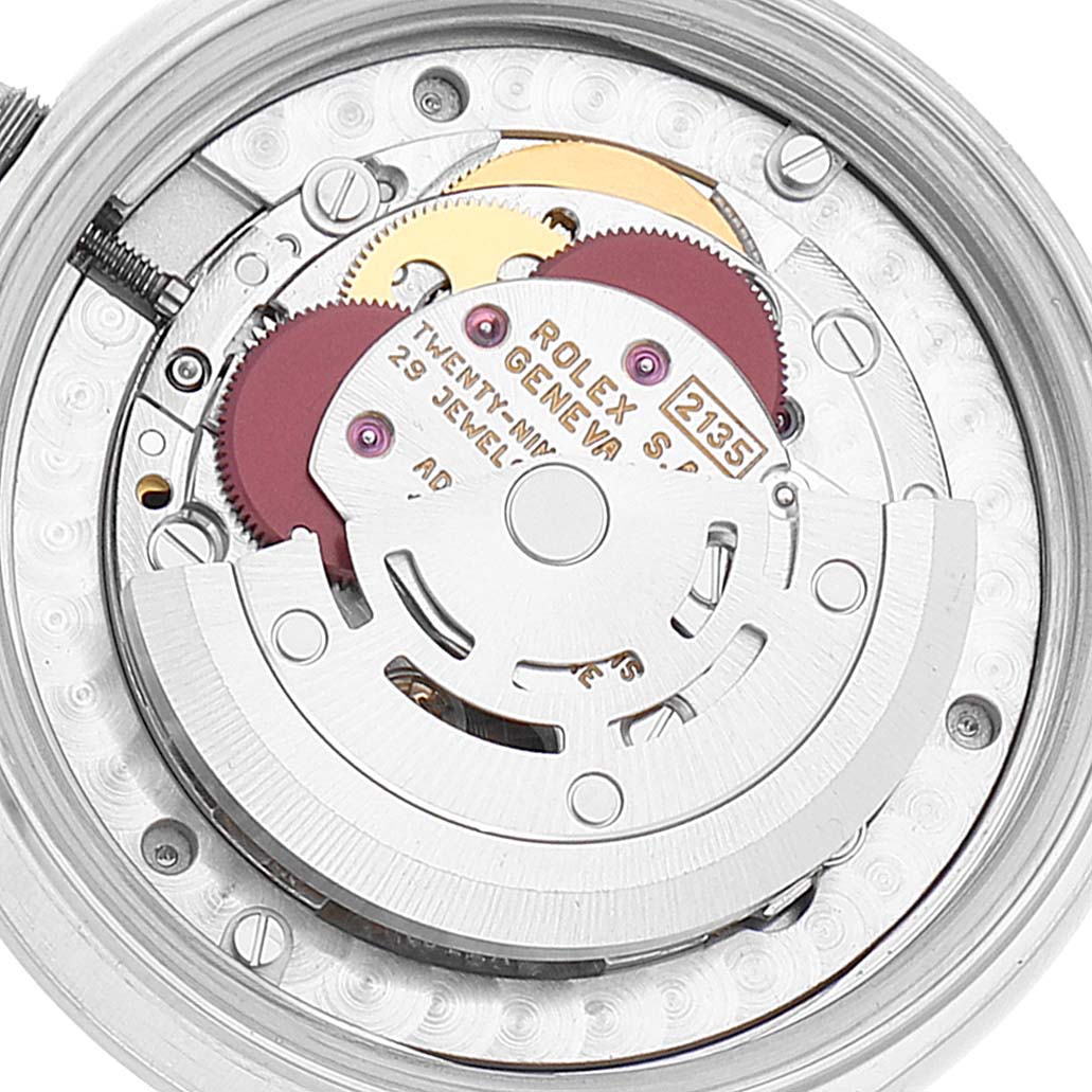 The image shows the internal mechanism of the Rolex Mid-Size 68240 Women
s Stainless Steel Blue Dial 68240 Women
s Stainless Steel Blue Dial model watch from a close-up, top-down angle.